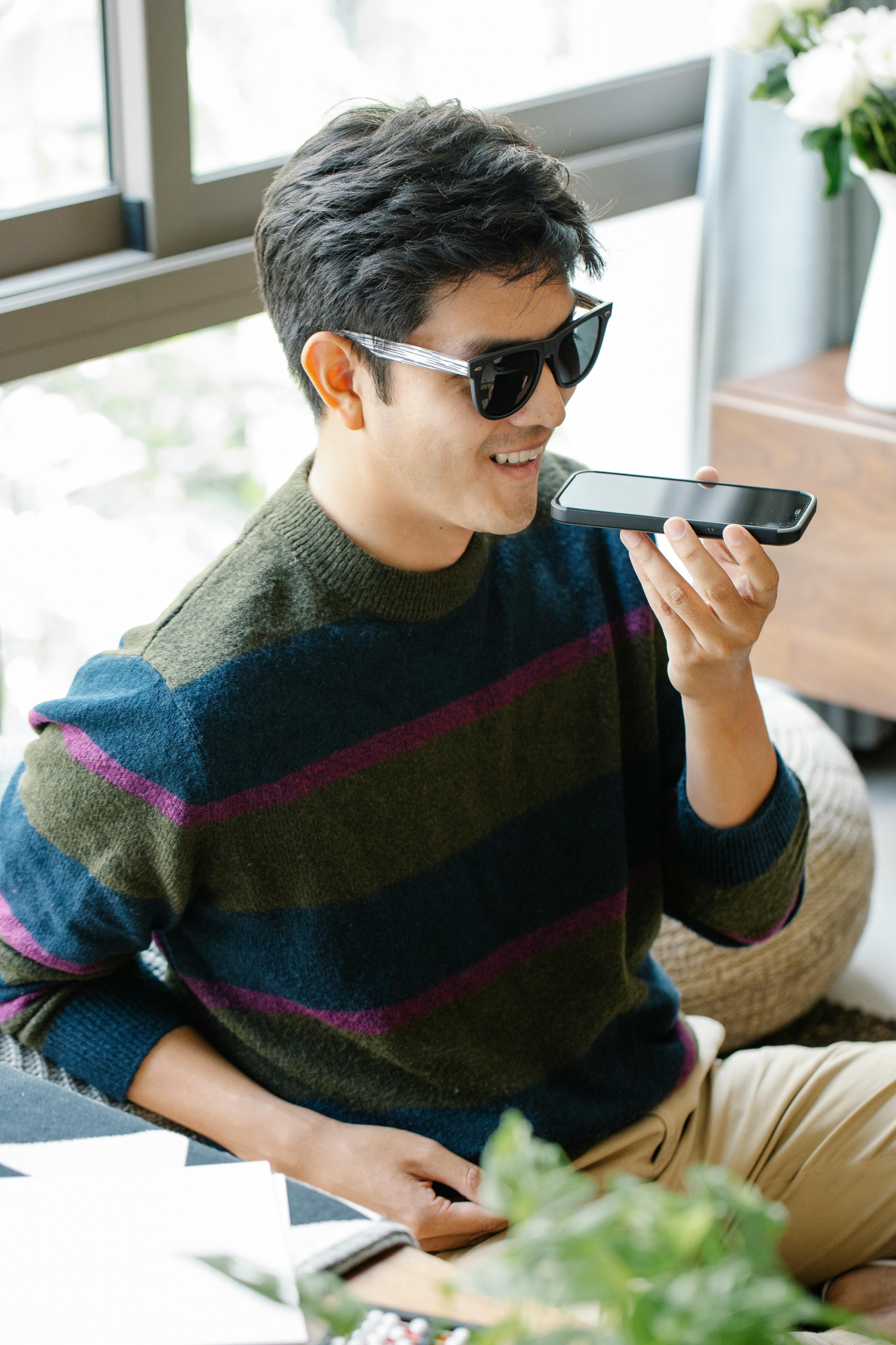 A happy man on a call | Source: Pexels