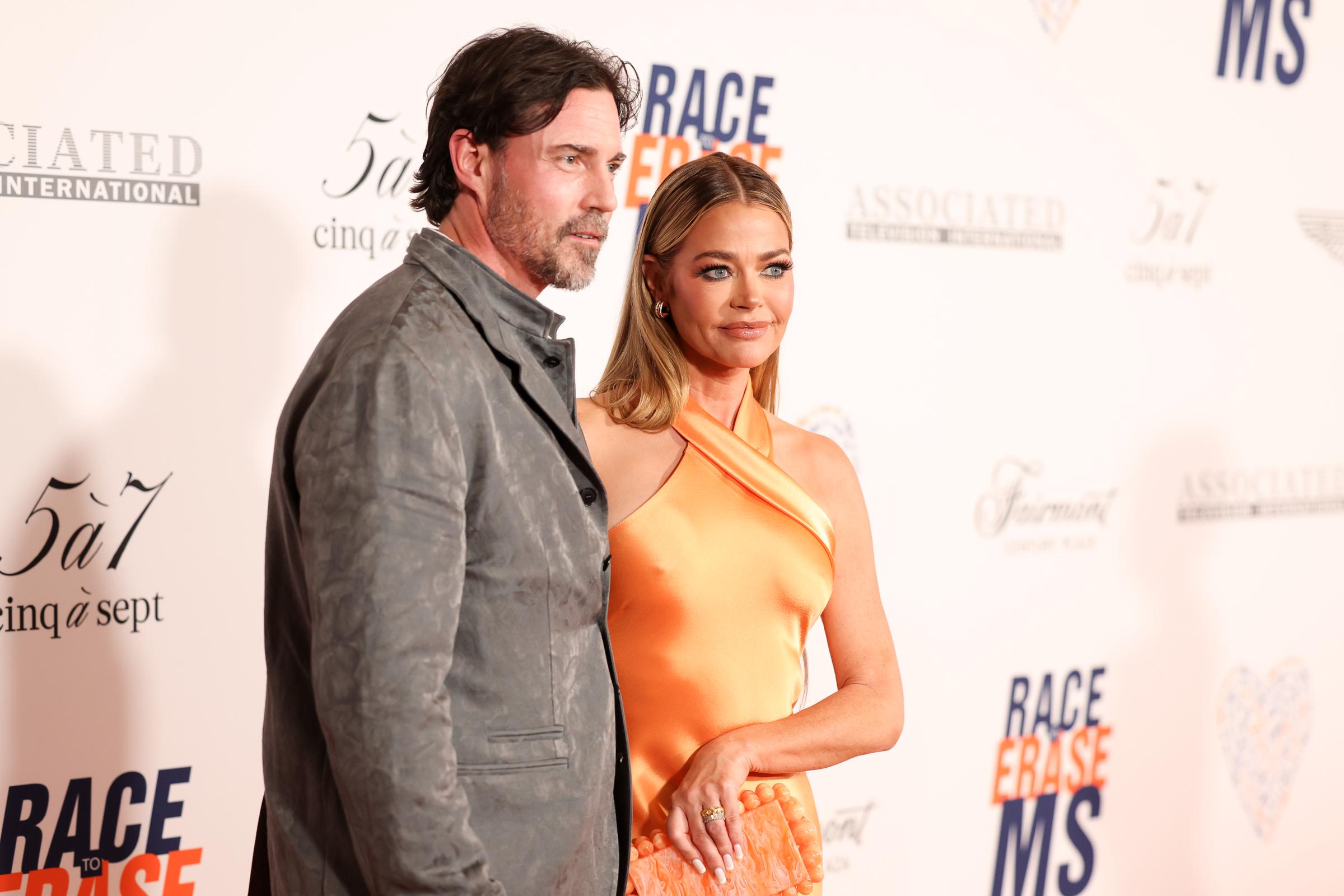 Aaron Phypers and Denise Richards at the 30th Annual Race to Erase MS Gala held at Fairmont Century Plaza on June 2, 2023, in Los Angeles, California. | Source: Getty Images