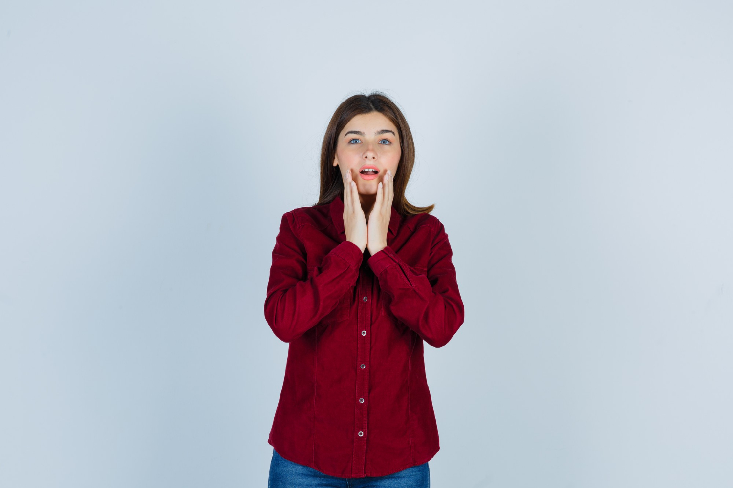 A shocked woman | Source: Freepik