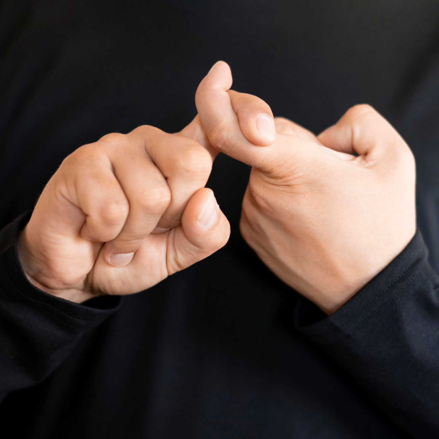 Close-up shot of a person making a hand gesture | Source: Freepik