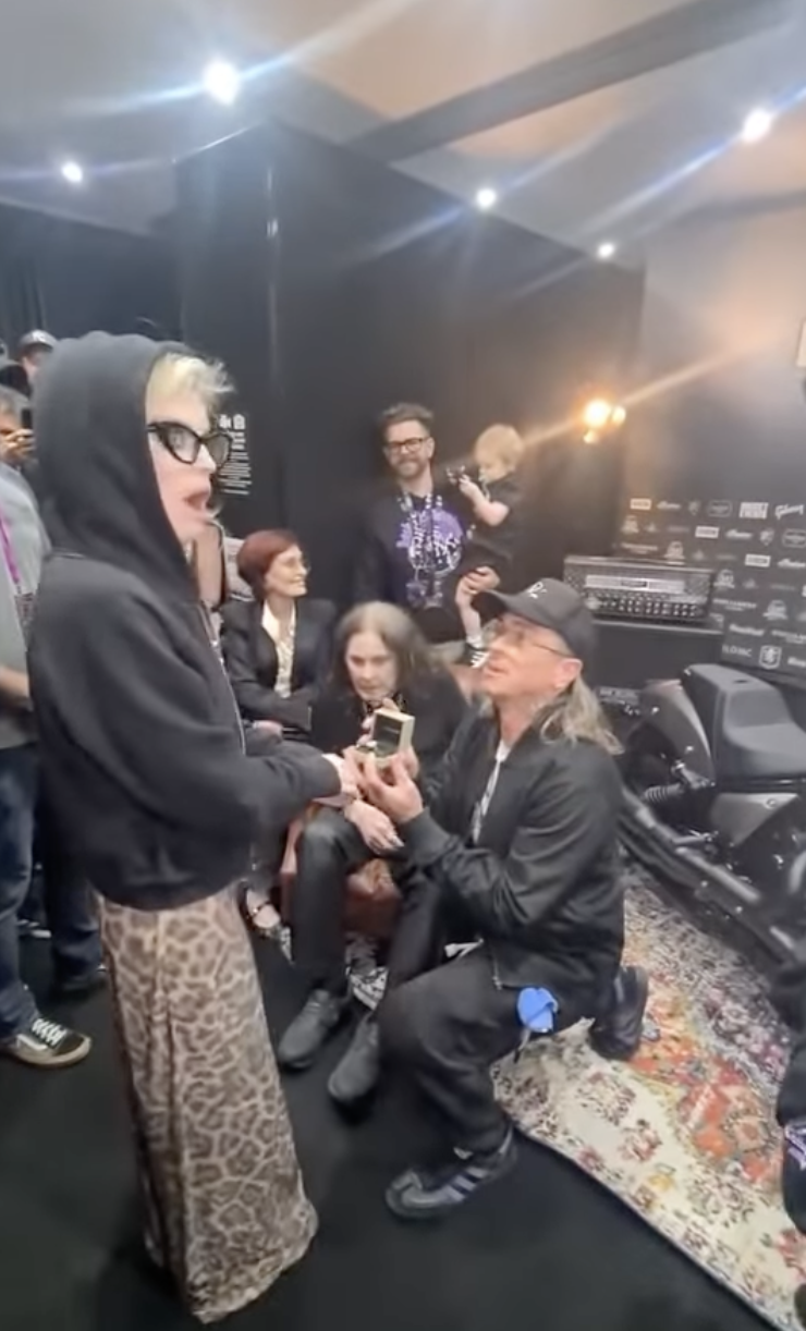 Sid Wilson gets down on one knee to propose to Kelly Osbourne on July 5, 2025 | Source: Instagram/kellyosbourne