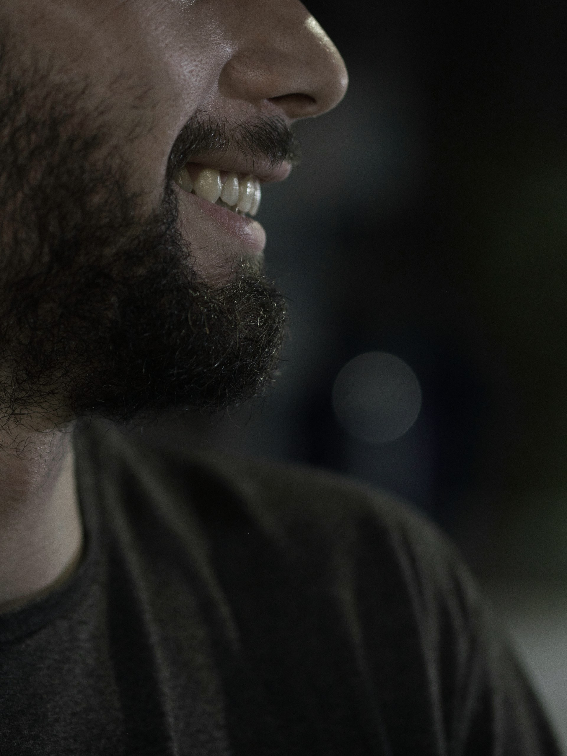 A man smiling at someone | Source: Unsplash