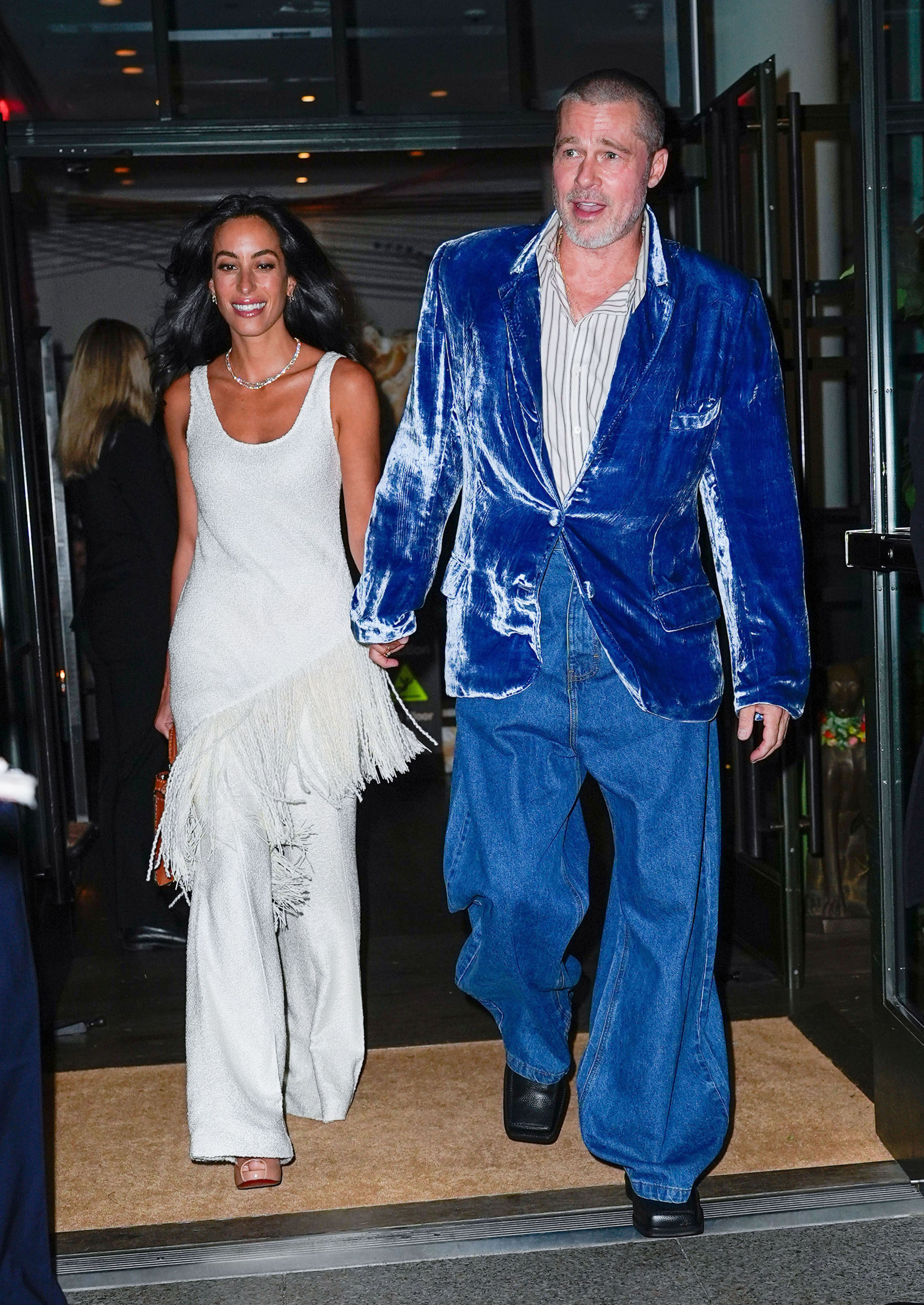 Brad Pitt and Ines de Ramon hold hands in New York City on June 14, 2025 | Source: Getty Images