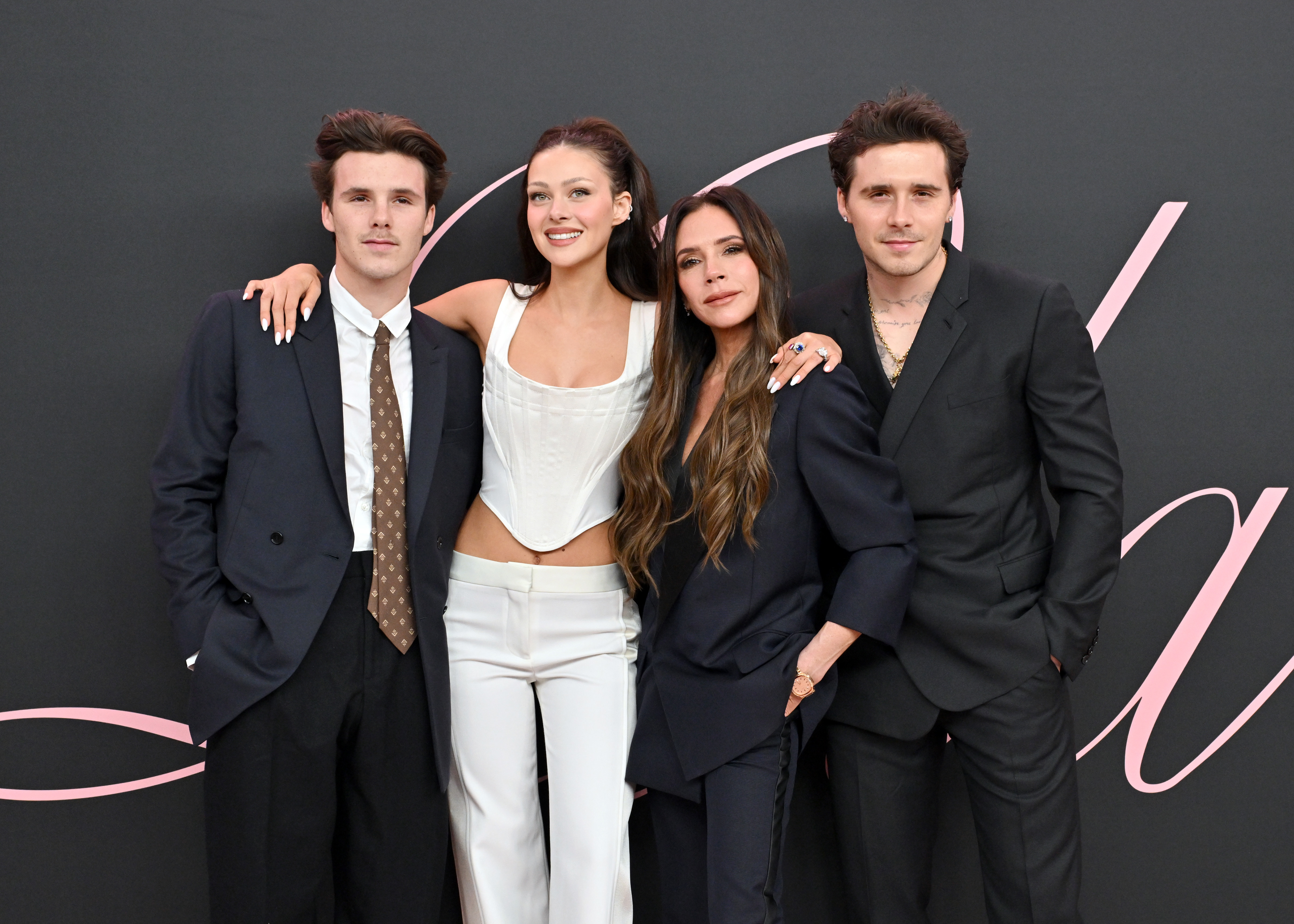 Cruz Beckham, Nicola Peltz Beckham, Victoria Beckham and Brooklyn Peltz Beckham attend the Premiere of "Lola" at Regency Bruin Theatre on February 3, 2024 in Los Angeles, California. | Source: Getty Images