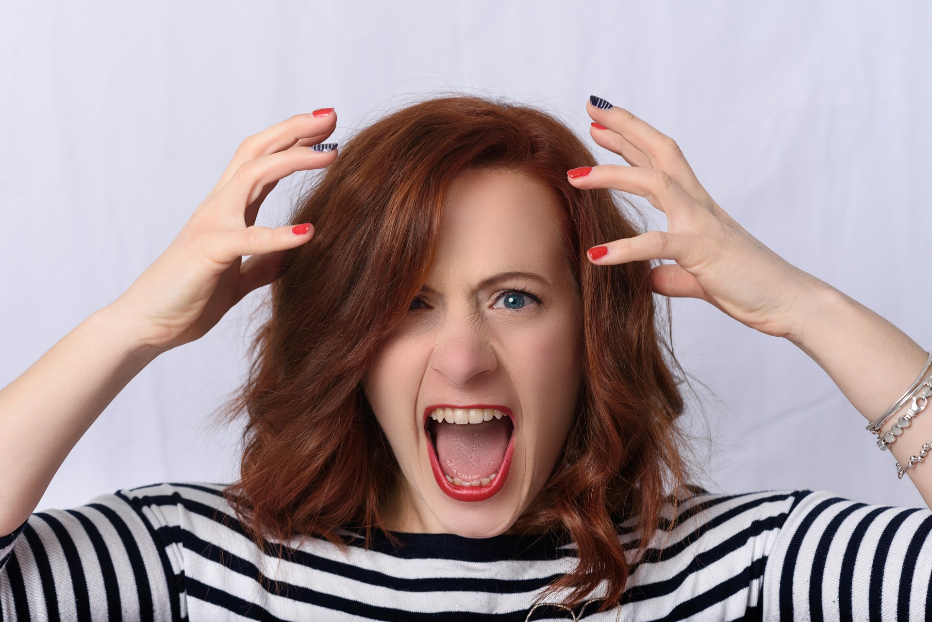 An angry woman yelling at someone | Source: Unsplash