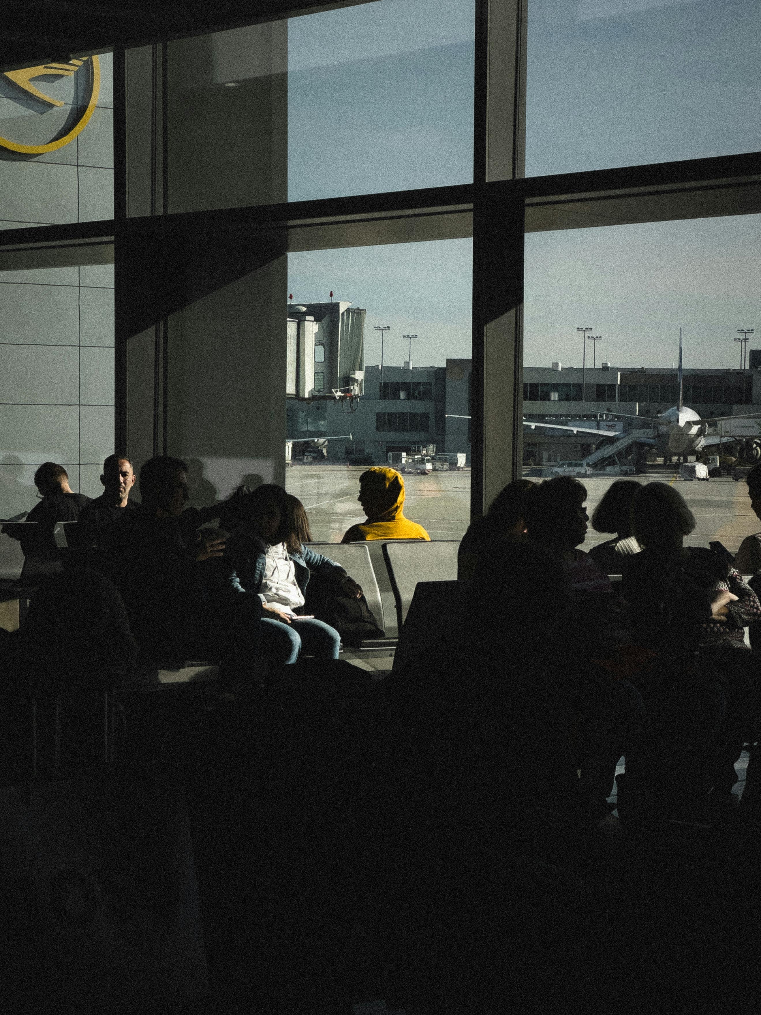 People sitting in an airport | Source: Pexels