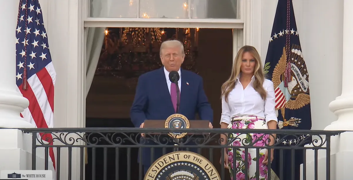 Melania Trump debuts a new hairstyle as she stood beside President Donald Trump on the Truman Balcony at the White House | Source: YouTube/The White House