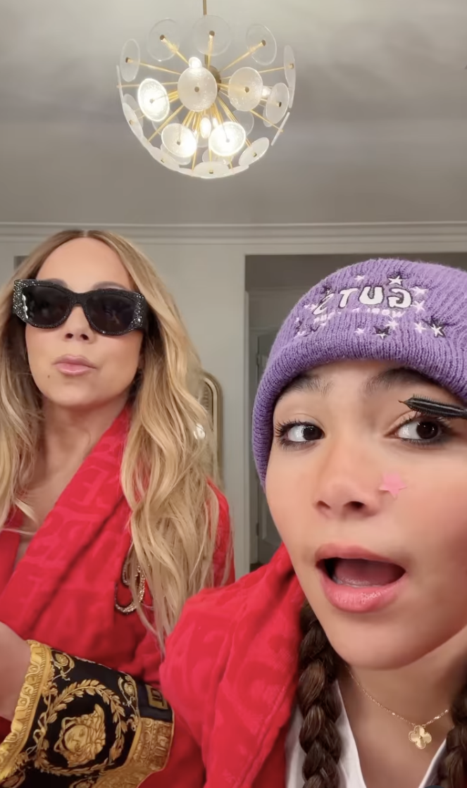 Mariah Carey and Monroe Cannon putting on makeup on an Instagram reel dated August 2, 2025. | Source: Instagram/mariahcarey