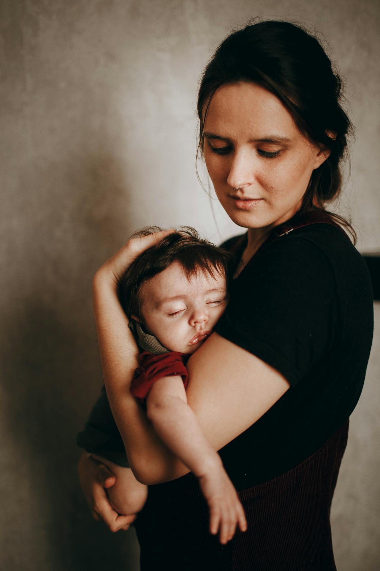 A woman holding a baby boy | Source: Pexels