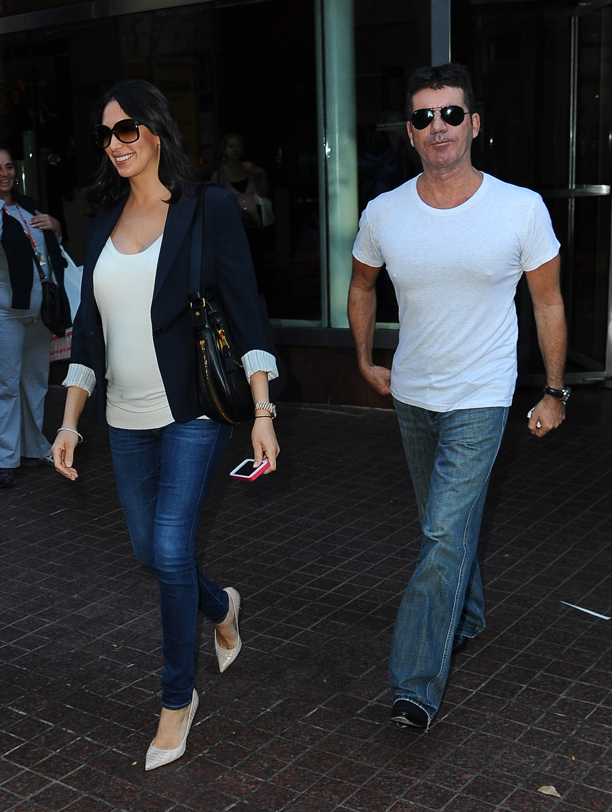 Lauren Silverman and Simon Cowell are seen in Soho on September 19, 2013 in New York City. | Source: Getty Images