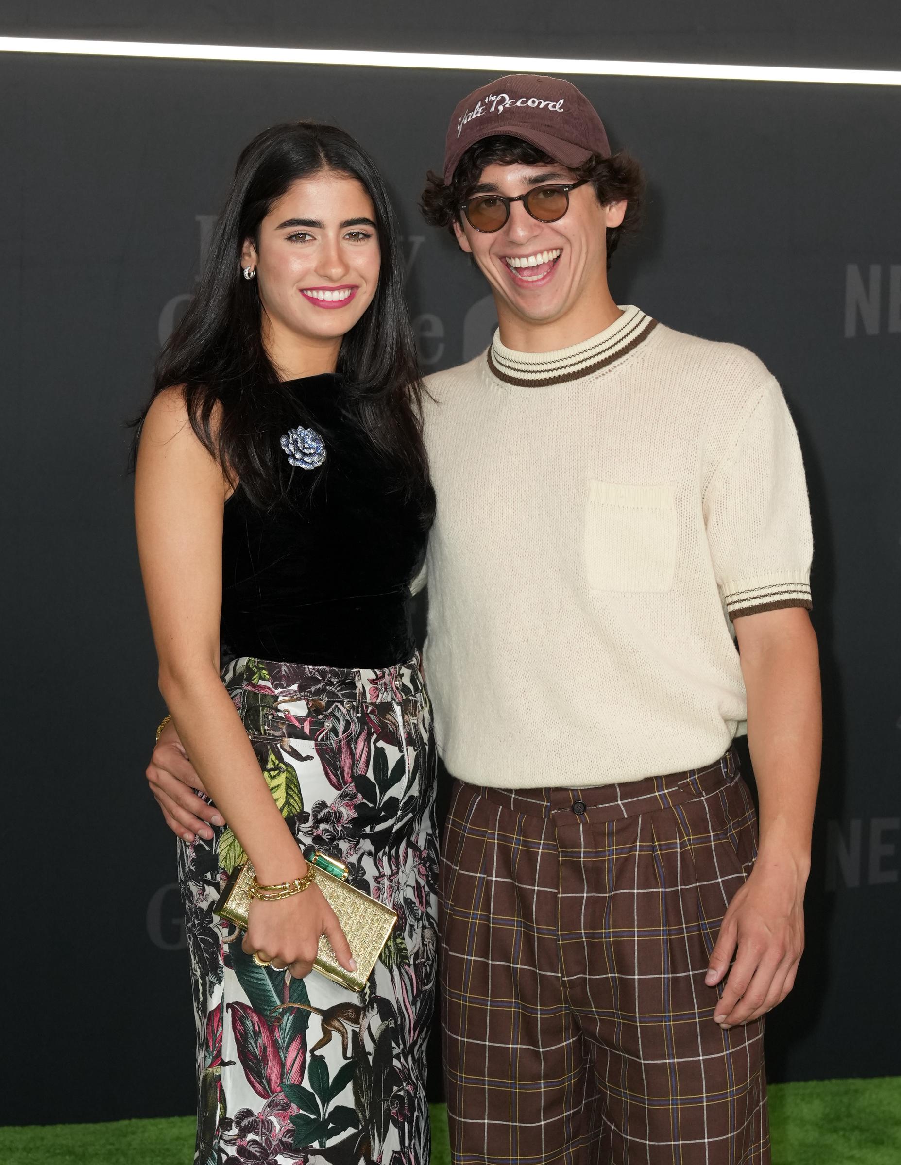 Ana Amelia Batlle Cabral and Marcello Hernandez poses on the red carpet at the New York premiere of "Happy Gilmore 2," 2025 | Source: Getty Images