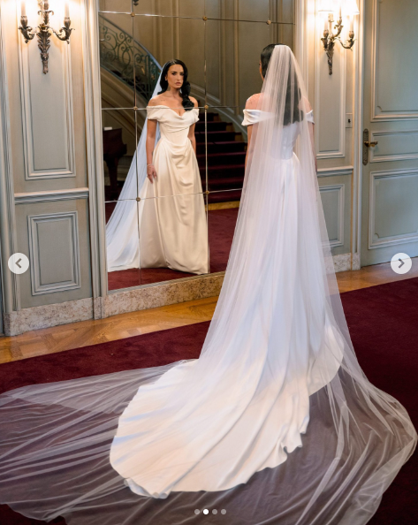 Demi Lovato pictured in her wedding gown, dated May 2025 | Source: Instagram/voguemagazine