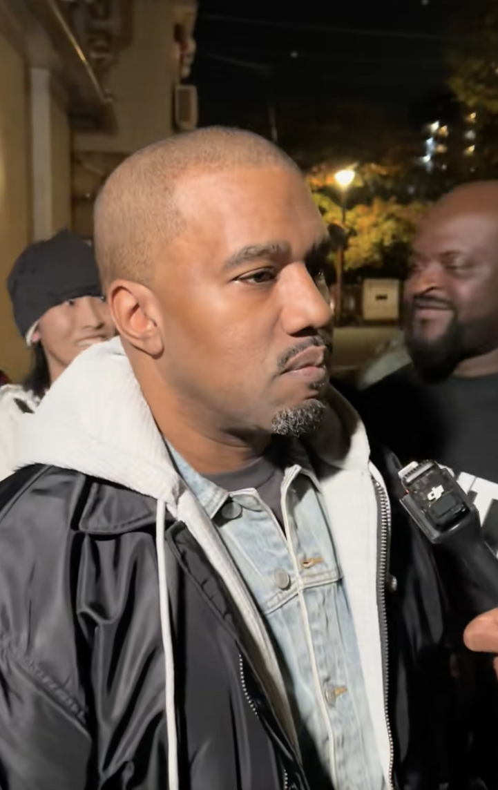Kanye West being interviewed by Mystery Fashionist in Tokyo, Japan, posted on November 21, 2025. | Source: TikTok/@mysteryfashionist