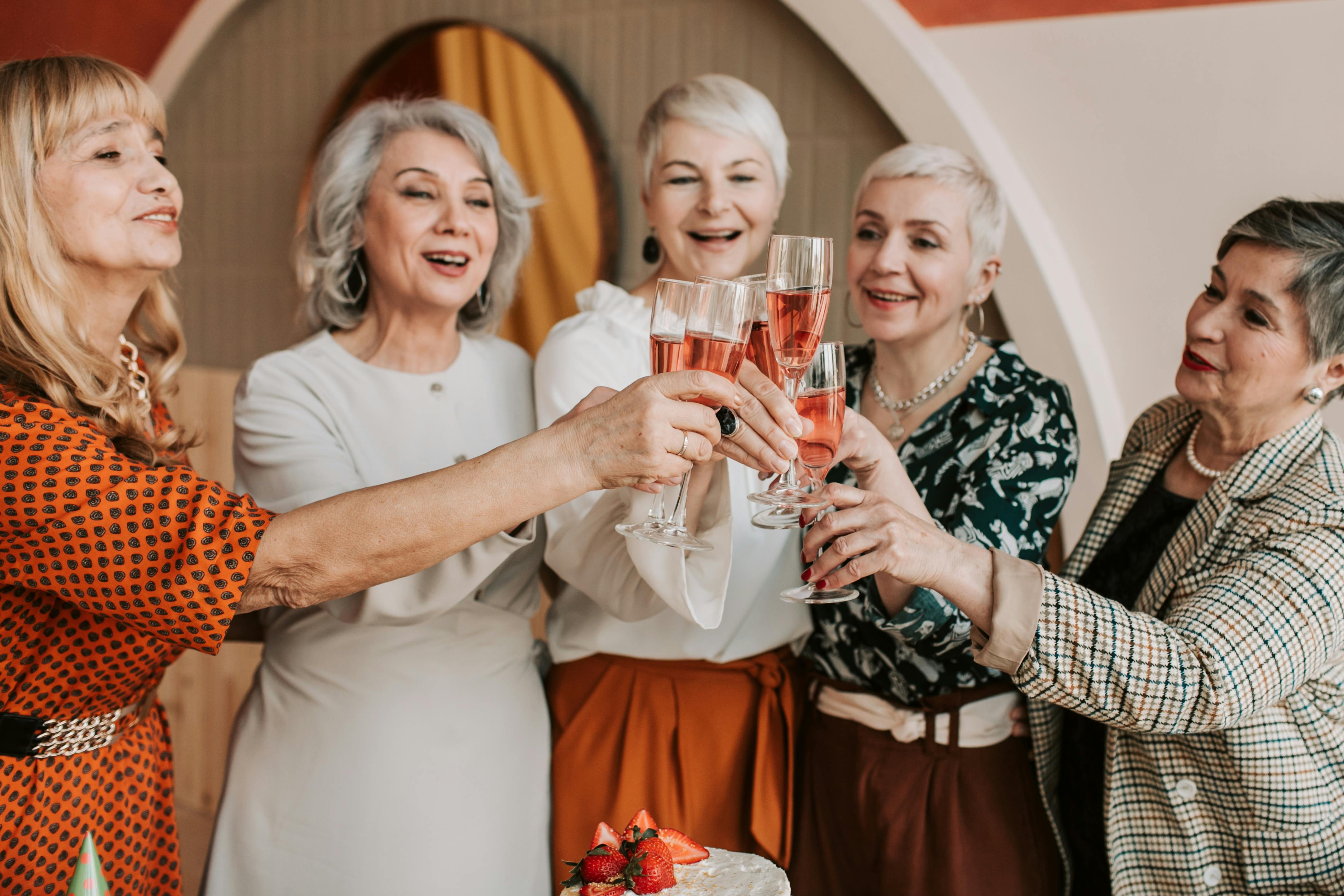 Friends toasting at a party | Source: Pexels