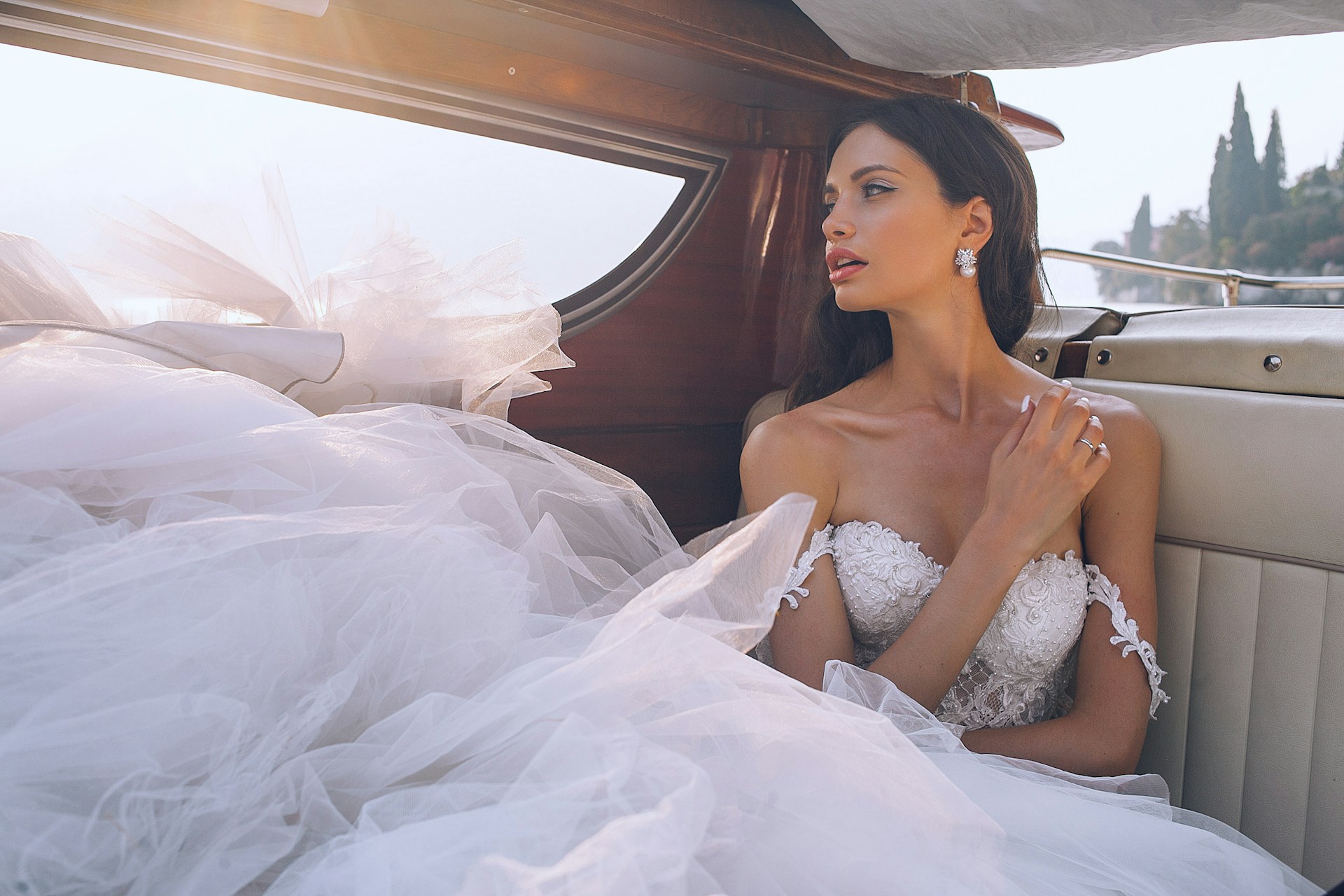 A bride looking out a car window | Source: Unsplash