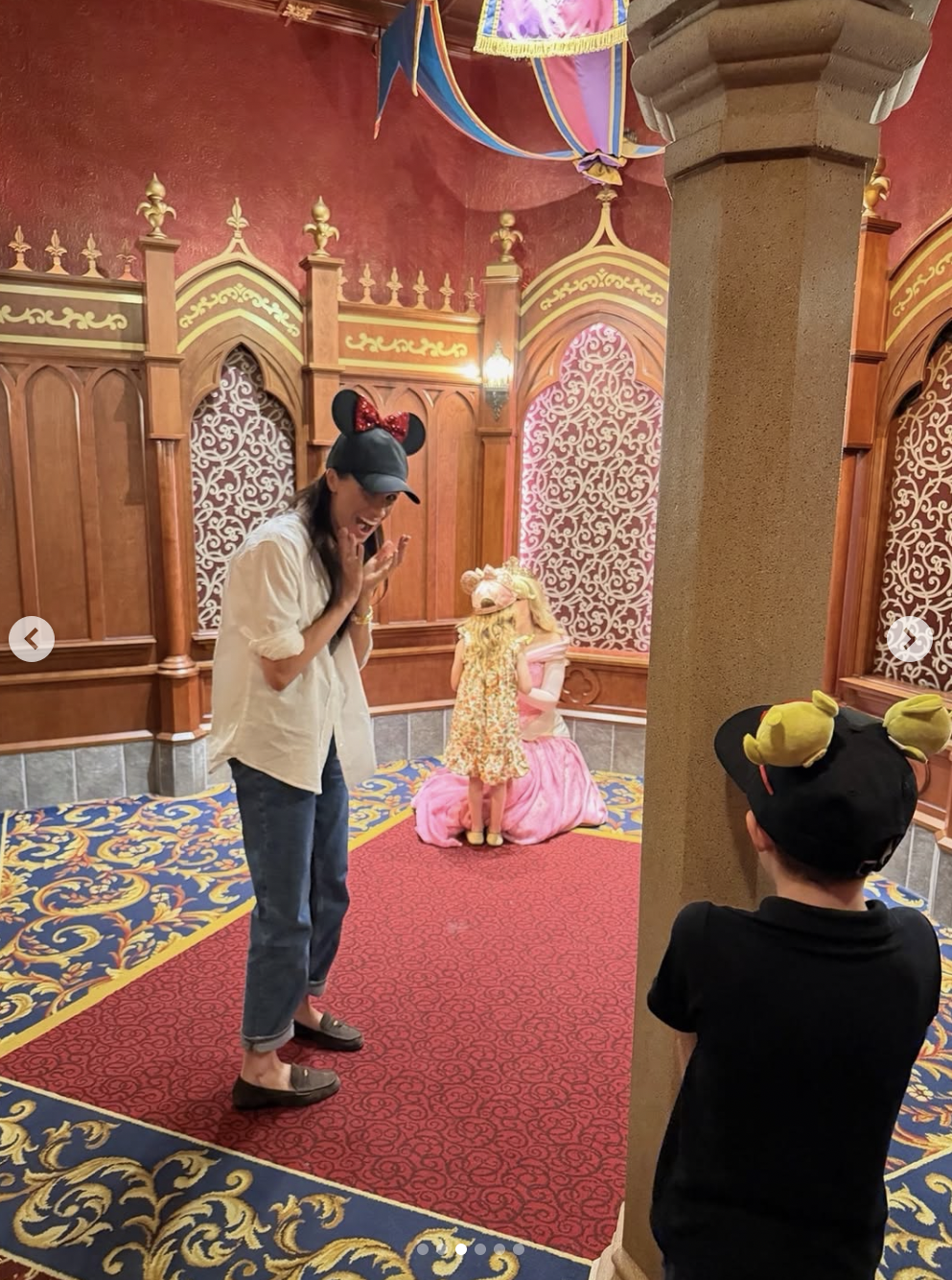 Princess Lilibet meeting Princess Aurora while Meghan Markle looks on at Prince Archie while at Disneyland Anaheim, posted on May 11. 2026. | Source: Instagram/meghan