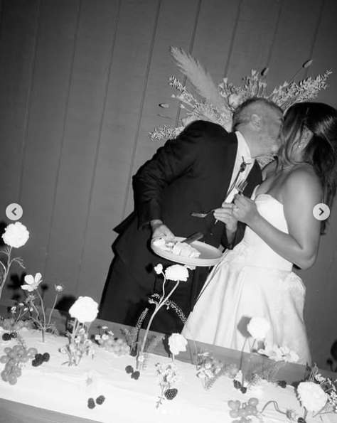 Chloe Mills sharing an intimate kiss with her newly wedded husband at their wedding posted on June 16, 2025 | Source: Instagram/chloenicolemills