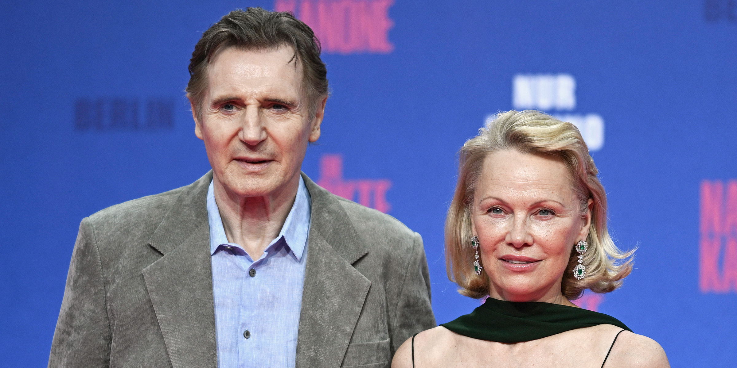 Pamela Anderson and Liam Neeson | Source: Getty Images
