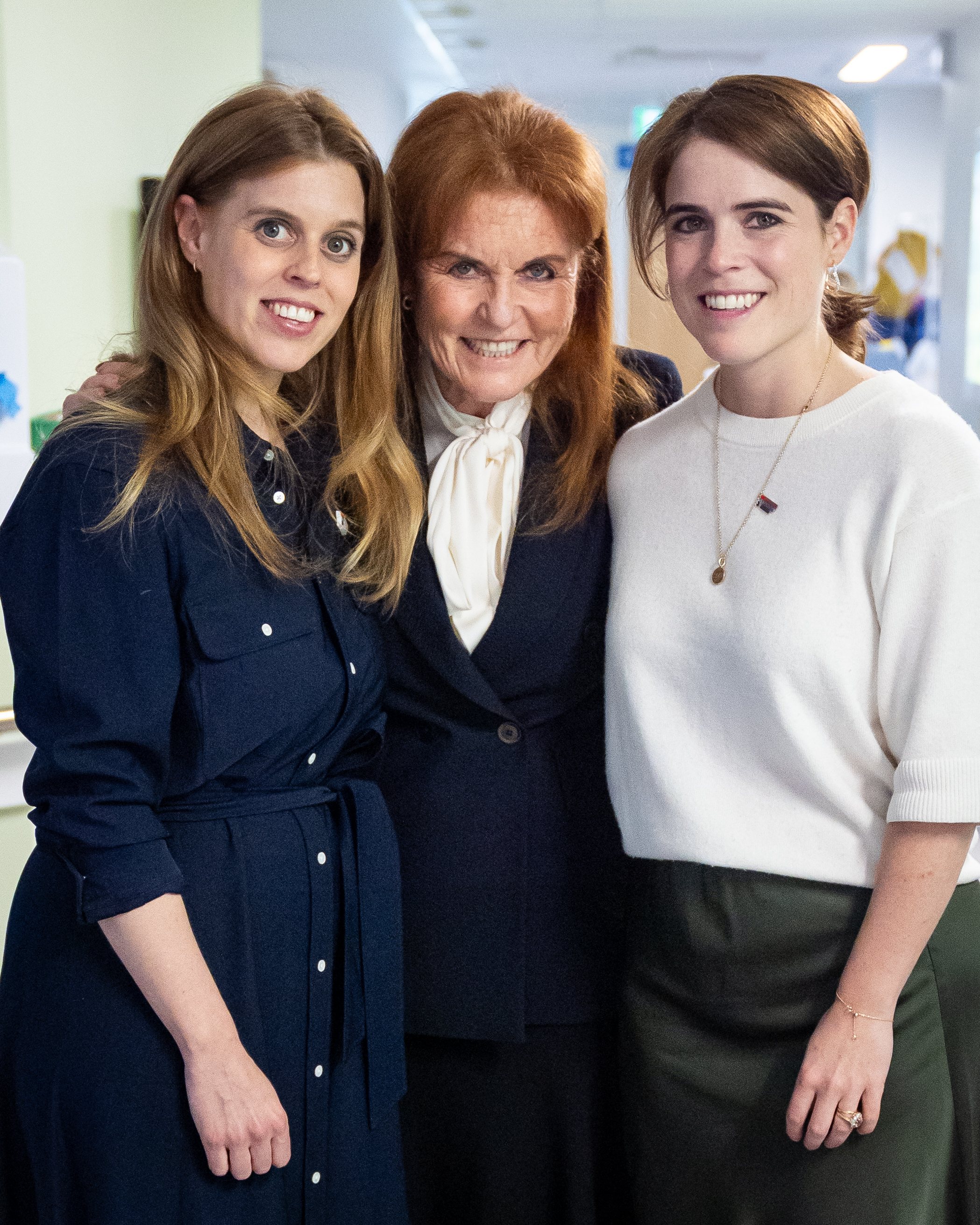 Sarah, Duchess of York with her daughters Princess Beatrice and Princess Eugenie during a visit to the Teenage Cancer Trust unit at University College Hospital, London. Picture date: Wednesday April 23, 2025. | Source: Getty Images