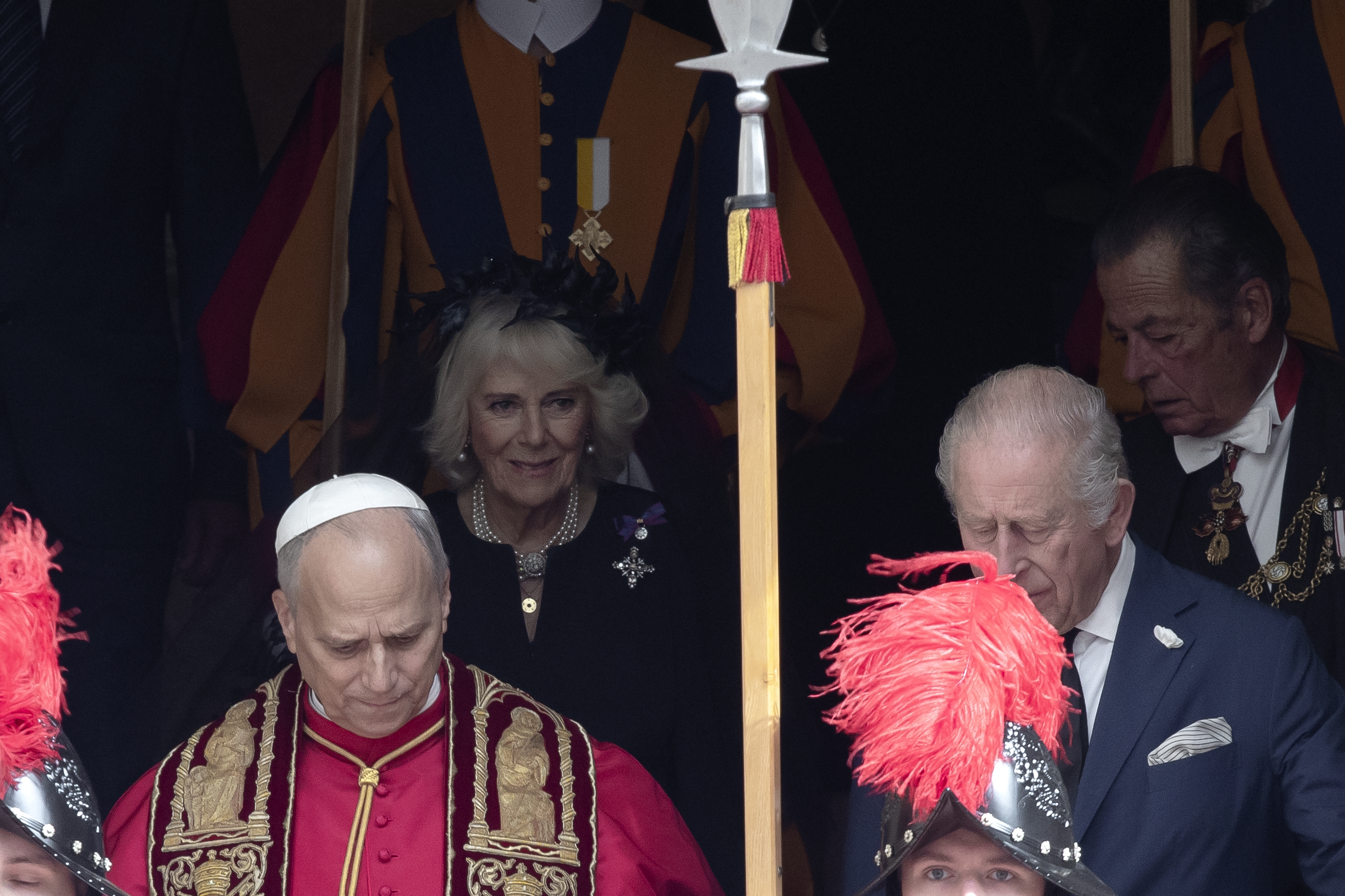 Pope Leo XIV, King Charles III and Queen Camilla in the San Damaso courtyard at the Vatican after the state visit and praying together in the Sistine Chapel. | Source: Getty Images