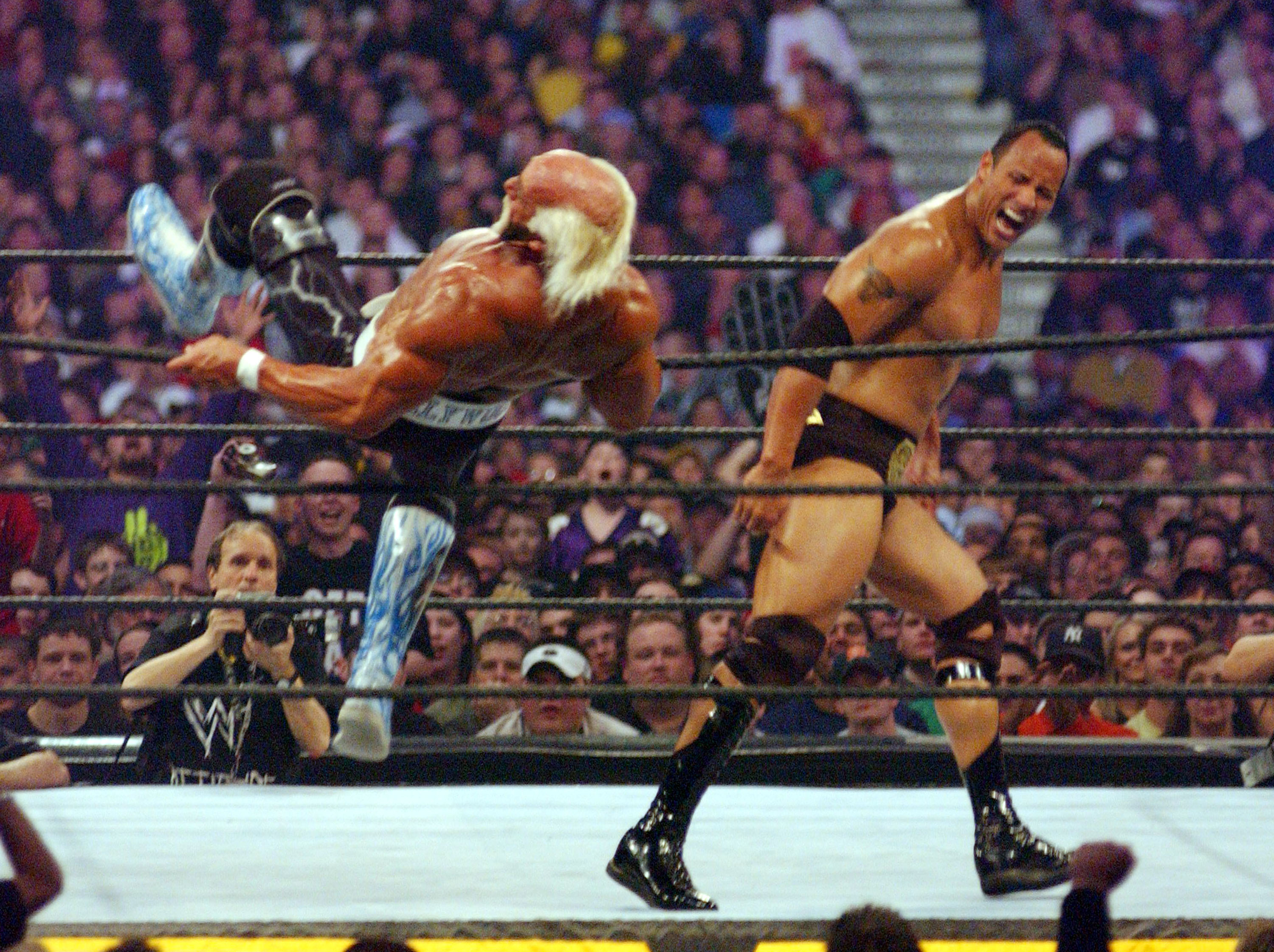 Hollywood Hulk Hogan and The Rock at Wrestlemania X8 on March 17, 2002 | Source: Getty Images