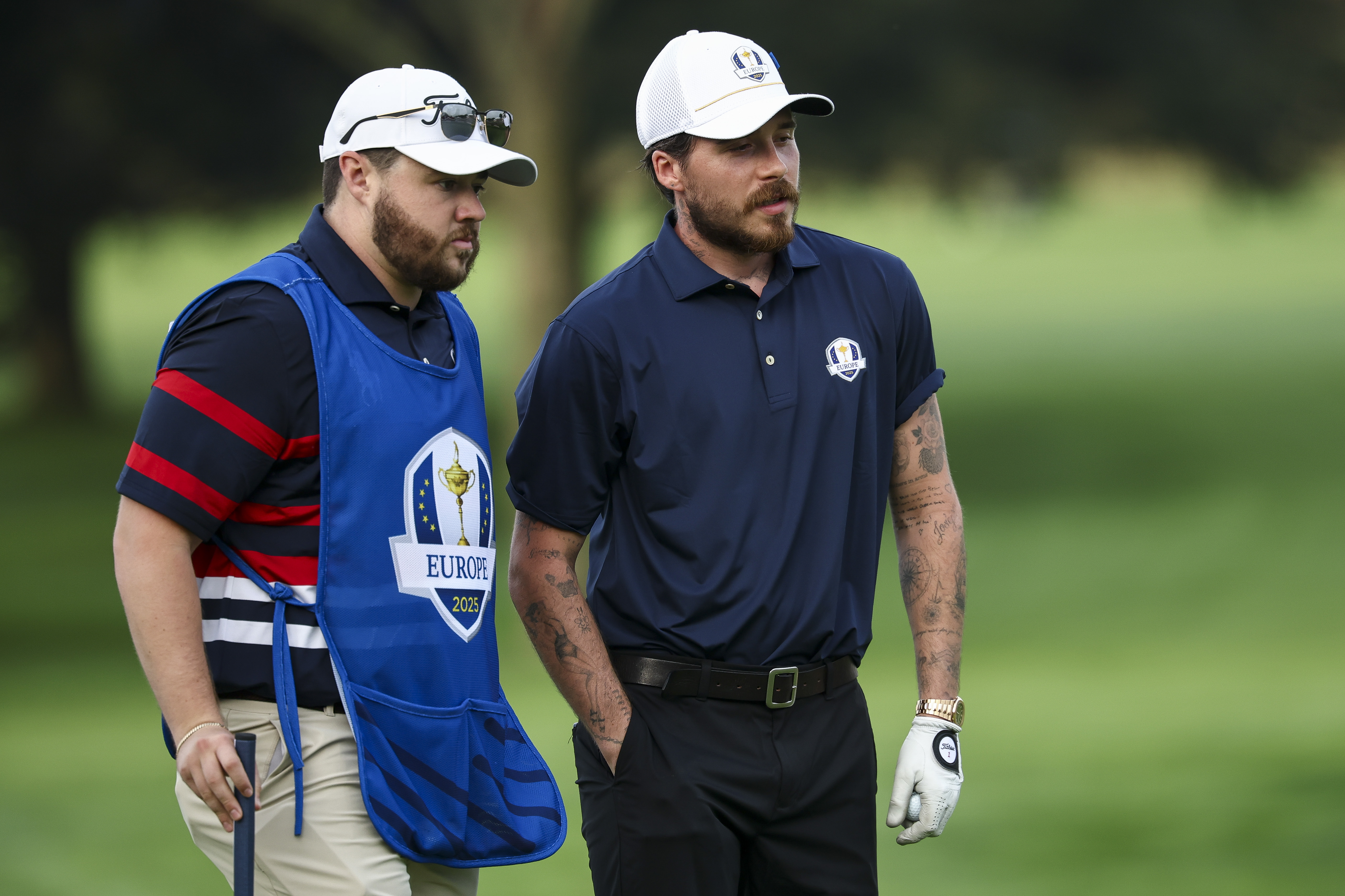 Brooklyn Peltz Beckham looks on with his caddie on the first green prior to the Ryder Cup 2025 at Black Course at Bethpage State Park Golf Course on September 24, 2025, in Farmingdale, New York. | Source: Getty Images