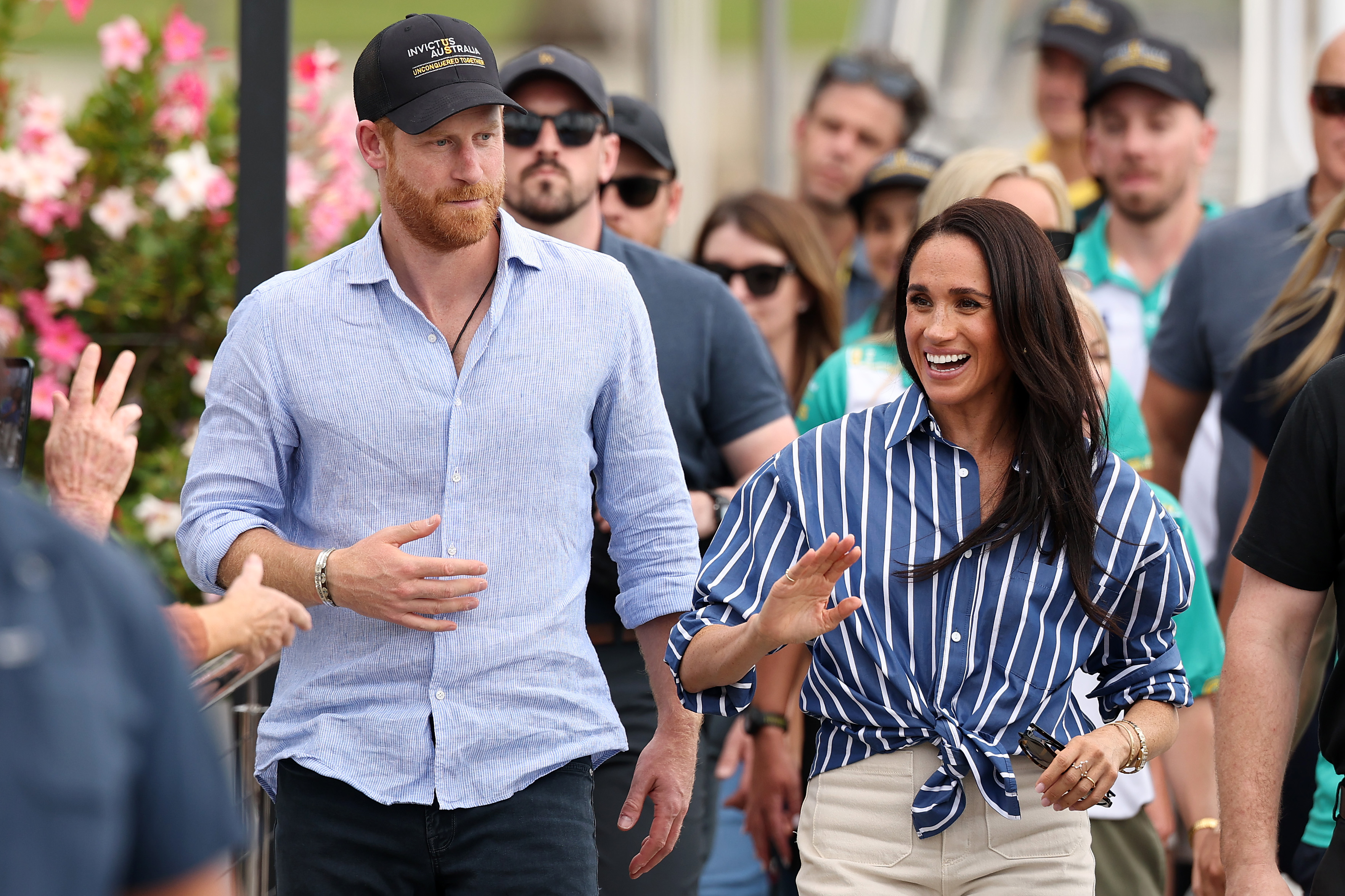 Prince Harry, Duke of Sussex and Meghan, Duchess of Sussex greet members of the public at the Cruising Yacht Club of Australia on April 17, 2026 in Sydney, Australia. | Source: Getty Images
