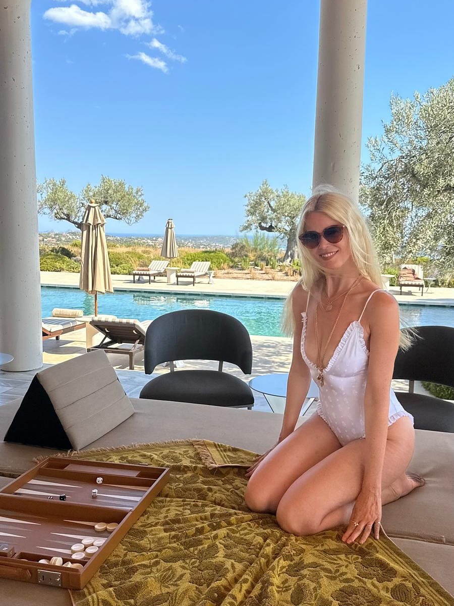 Claudia Schiffer poses poolside in a photo shared on August 25, 2025. | Source: Instagram/claudiaschiffer