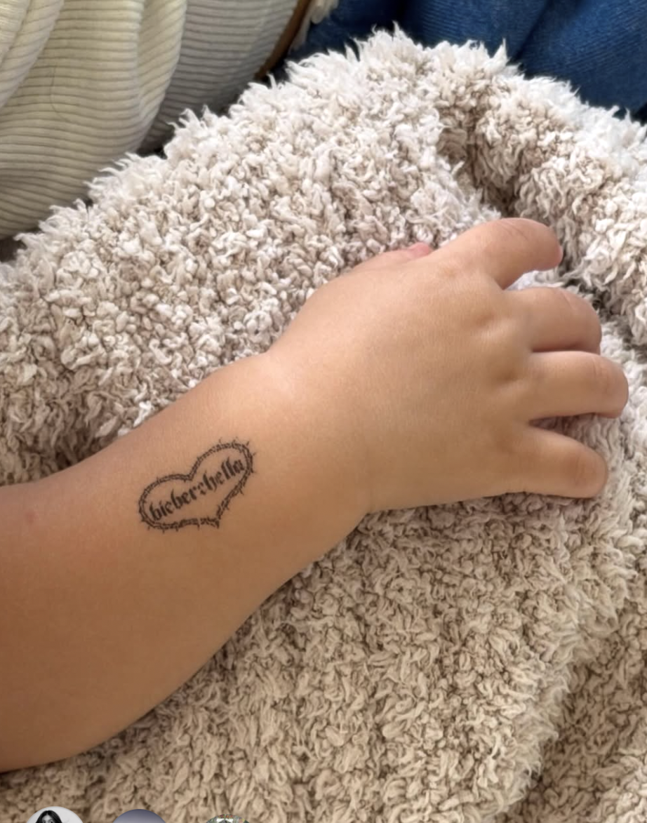 Jack Bieber with a temporary "Bieberchella" tattoo, posted by Hailey Bieber on April 13, 2026. | Source: Instagram/haileybieber