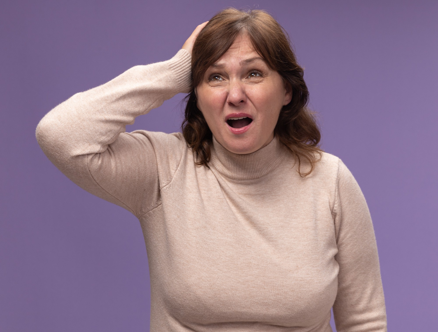 An anxious and shaken woman | Source: Freepik