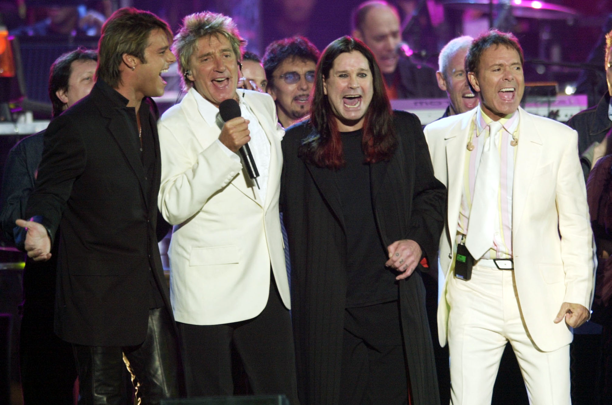 Ricky Martin, Rod Stewart, Ozzy Osbourne and Cliff Richard on stage during the Golden Jubilee concert at Buckingham Palace on August 11, 2017. | Source: Getty Images