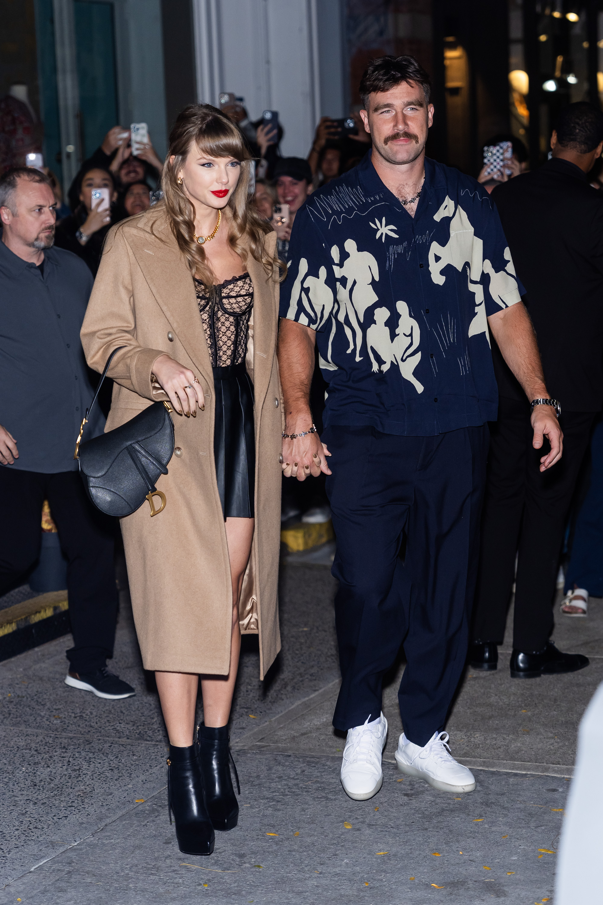 aylor Swift (L) and Travis Kelce are seen in SoHo on October 11, 2024, in New York City. | Source: Getty Images
