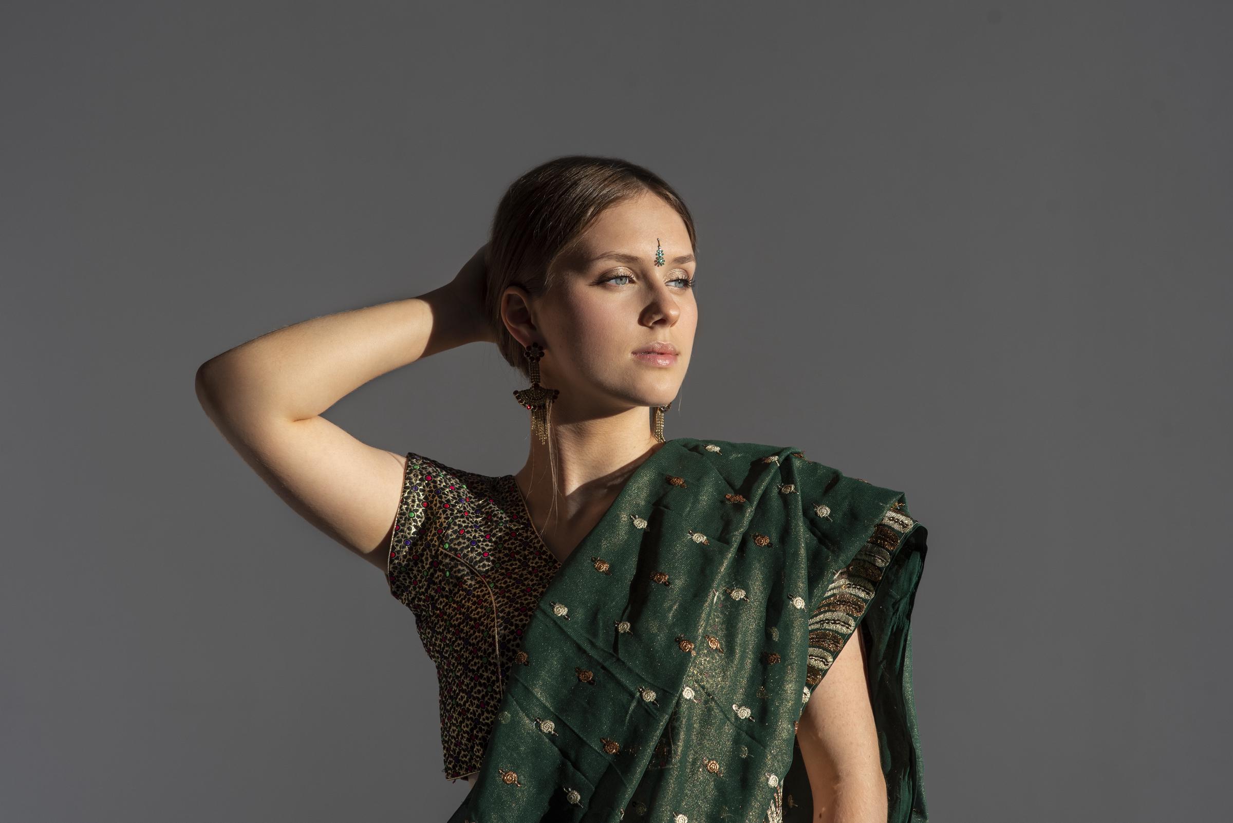 A woman in Indian clothing | Source: Freepik