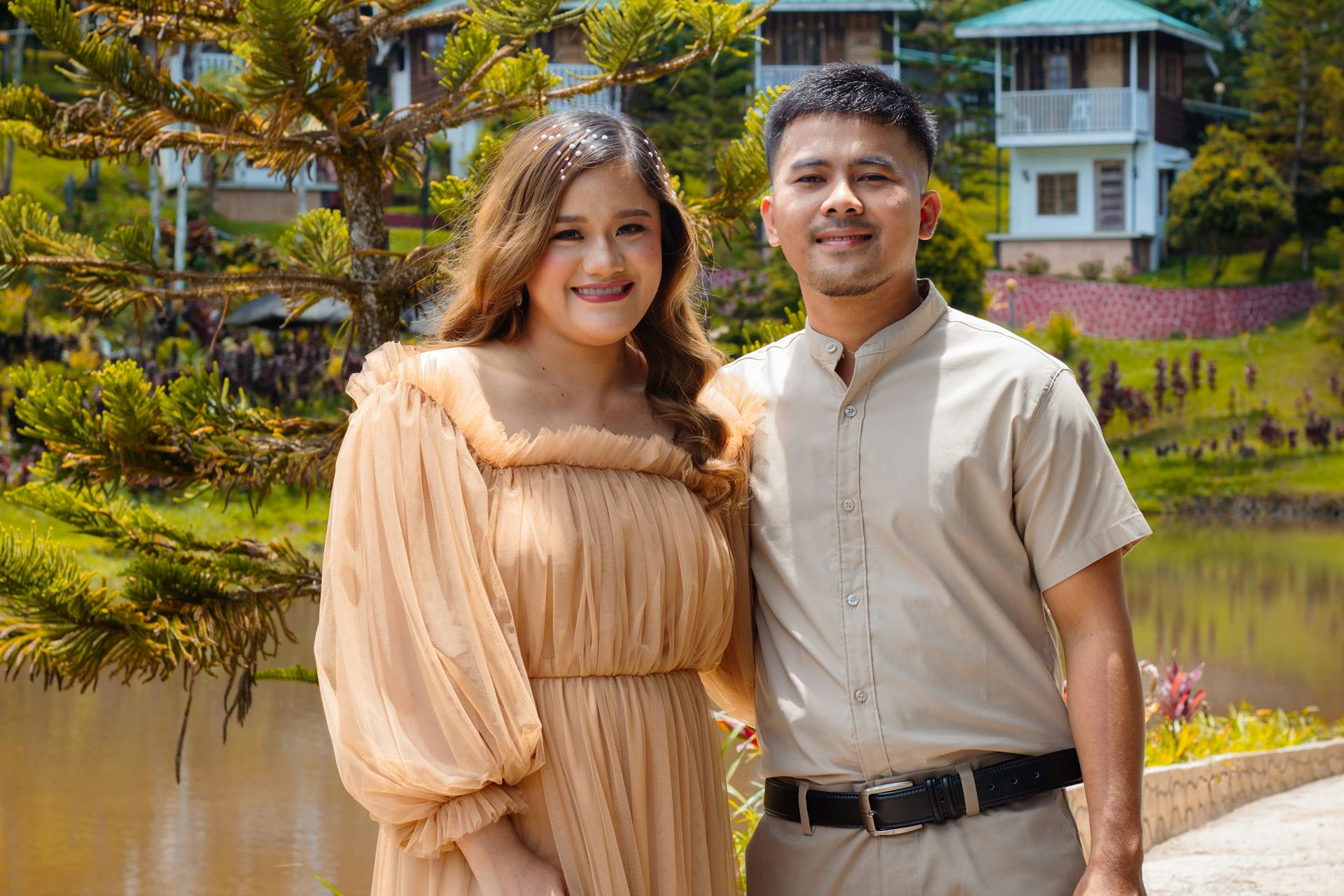 A couple having a photoshoot by a lake | Source: Pexels