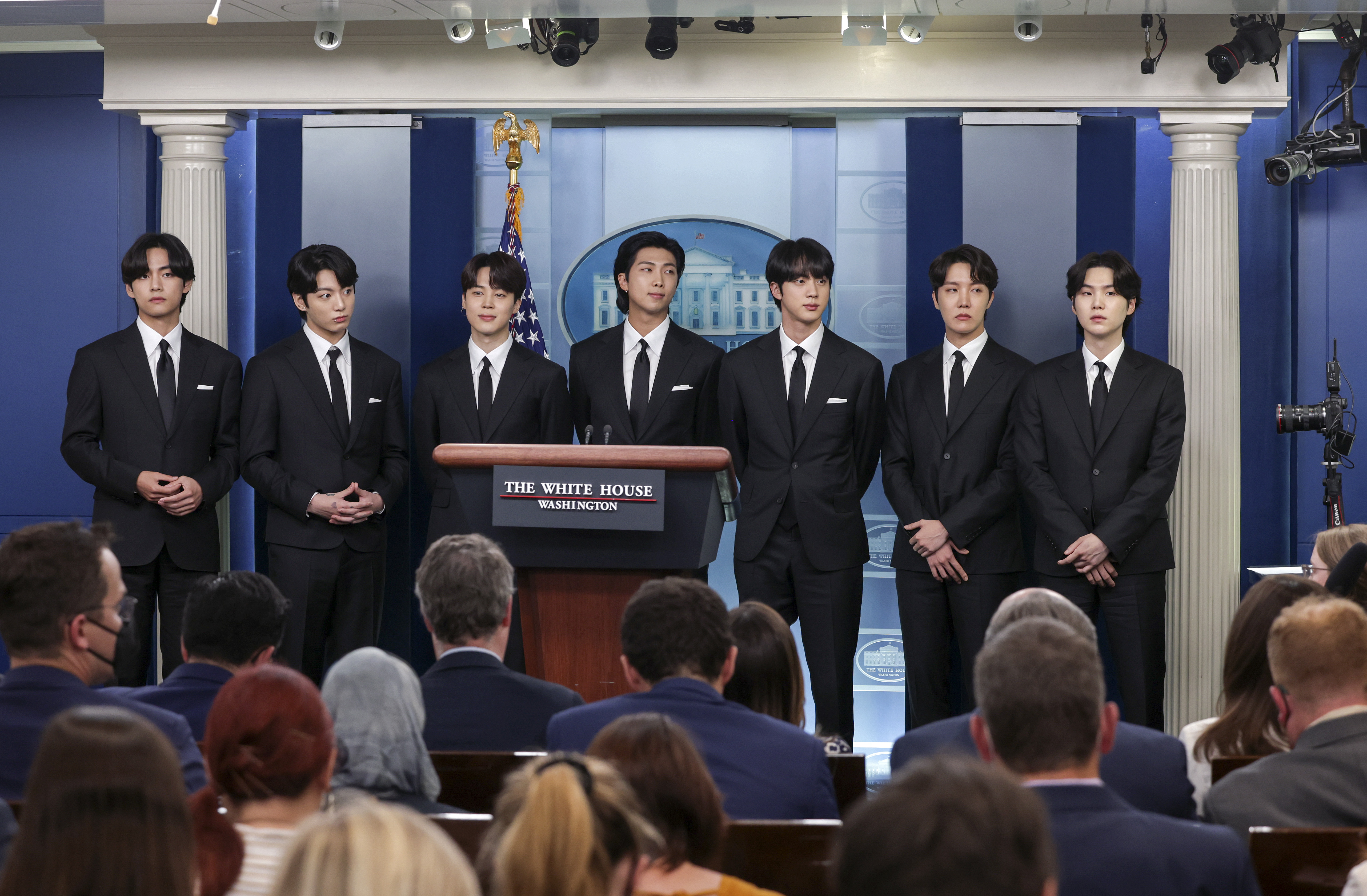 V, Jungkook, Jimin, RM, Jin, J-Hope and Suga of the South Korean pop group BTS speak at the daily press briefing at the White House on May 31, 2022 in Washington, DC | Source: Getty Images
