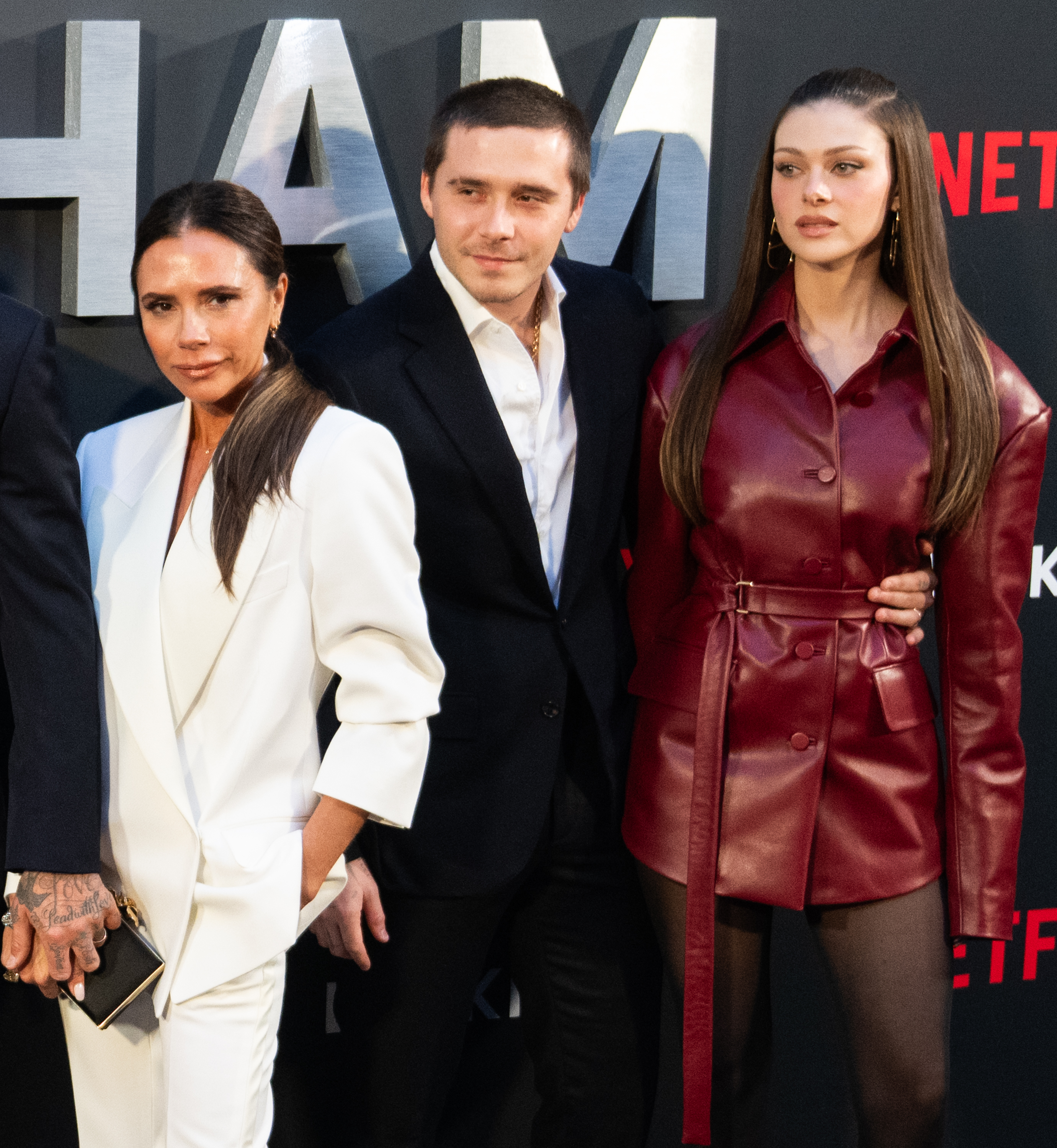 Victoria Beckham, Brooklyn Beckham and Nicola Peltz at the UK premiere of Netflix's "Beckham" on October 3, 2023 in London, England | Source: Getty Images