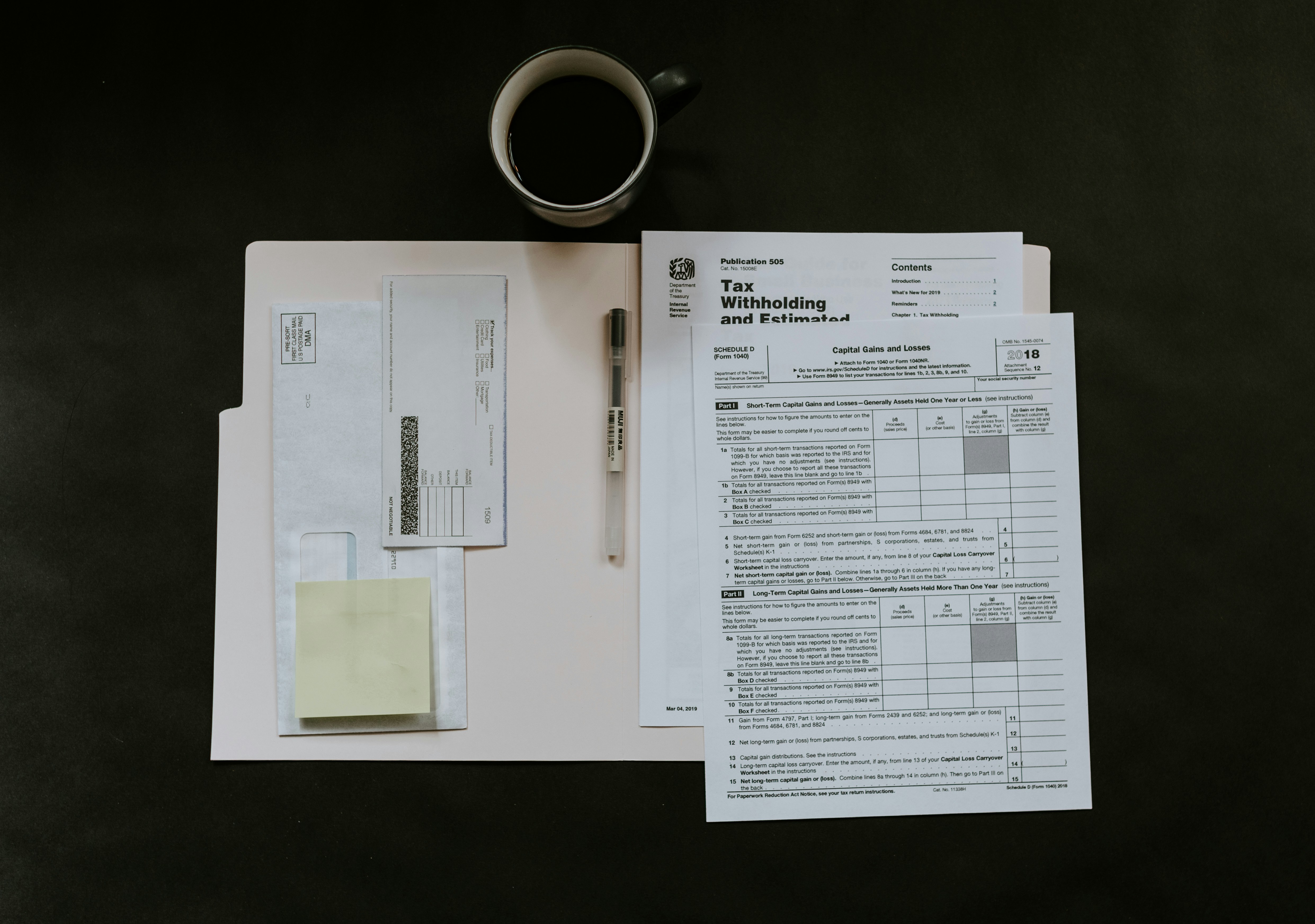 Documents on a table | Source: Pexels