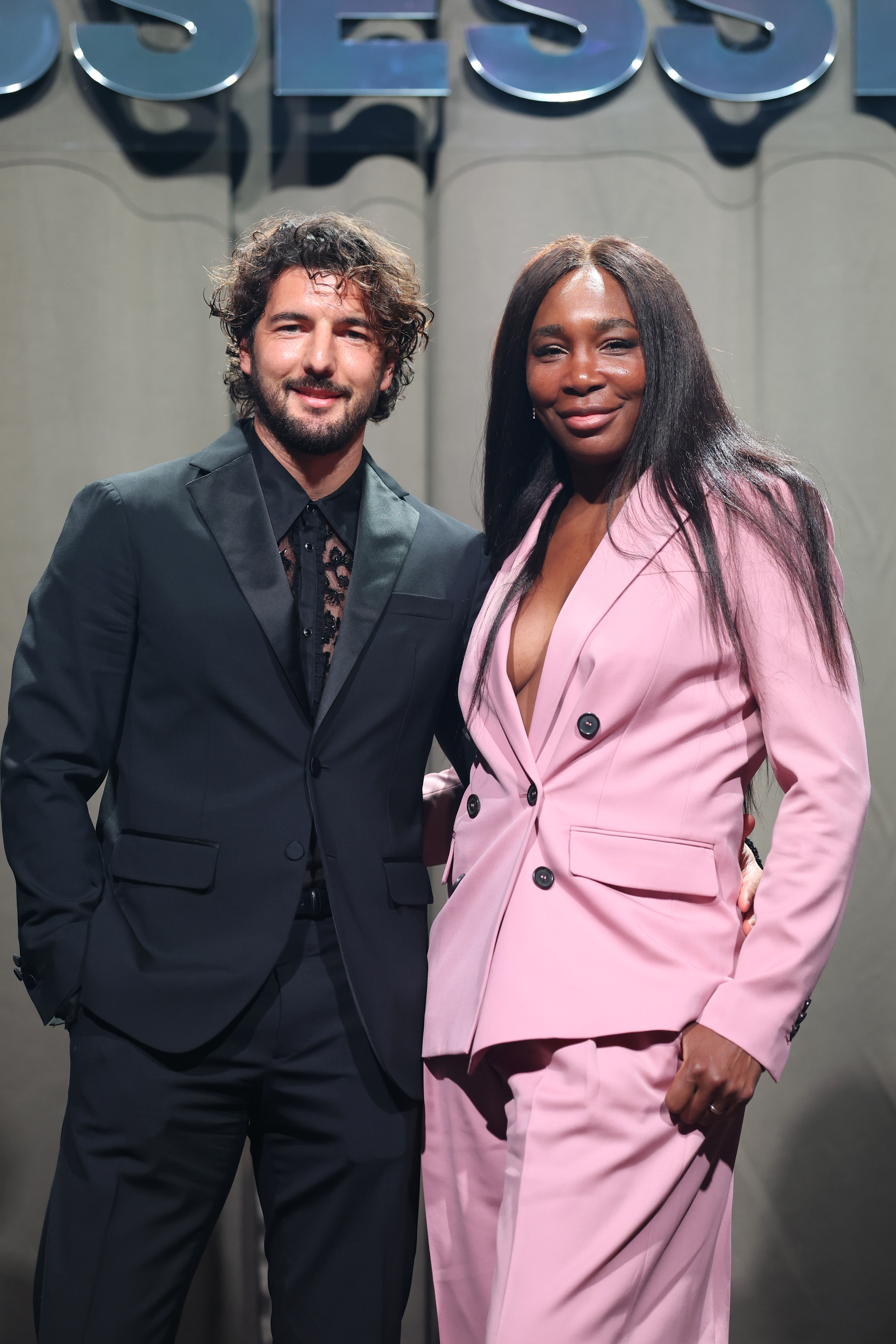 Andrea Preti and Venus Williams attend the photocall ahead of the Dsquared2 F/W 2025 - 2026 runway during the Milan Fashion Week - Womenswear Fall/Winter 2025/2026 at on February 25, 2025, in Milan, Italy. | Source: Getty Images