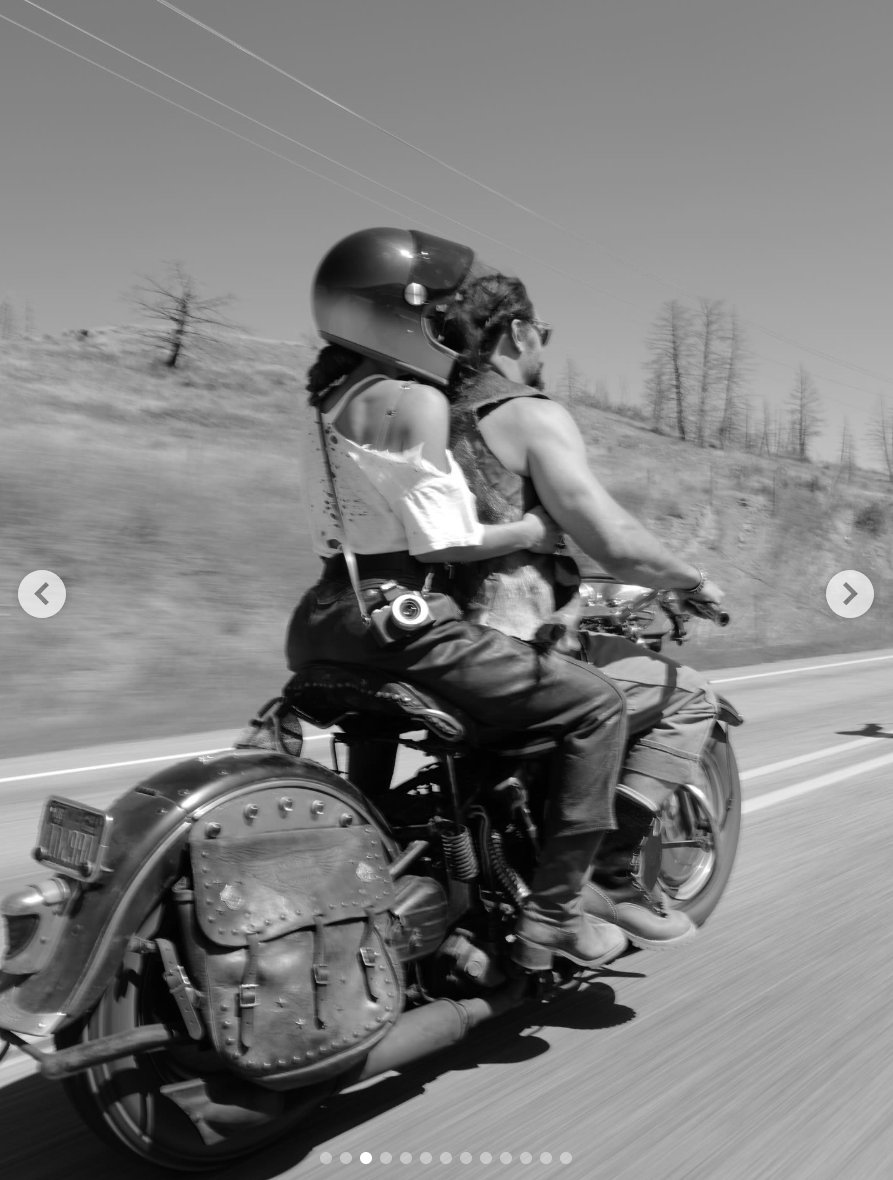 Jason Momoa and Adria Arjona photographed riding a motorcycle, posted on August 1, 2025. | Source: Instagram/adriaarjona