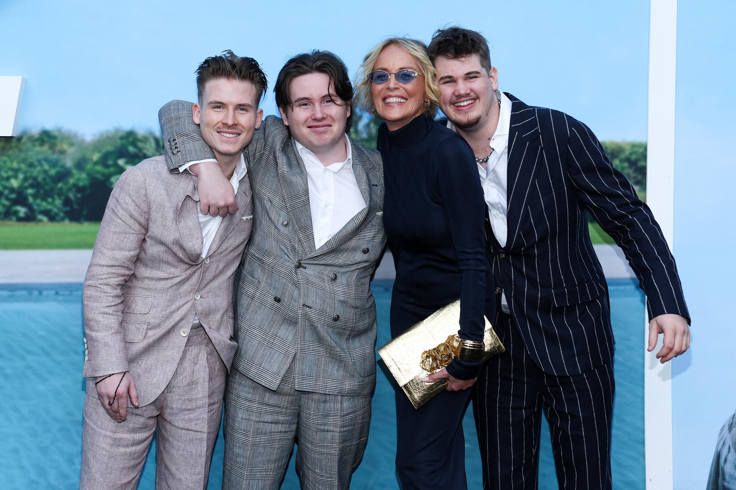 Sharon Stone and her sons (L-R) Roan Stone, Quinn Stone and Laird Stone attend the premiere of Universal's "Nobody 2" at the TCL Chinese Theatre in Hollywood, California, on August 11, 2025. | Source: Getty Images