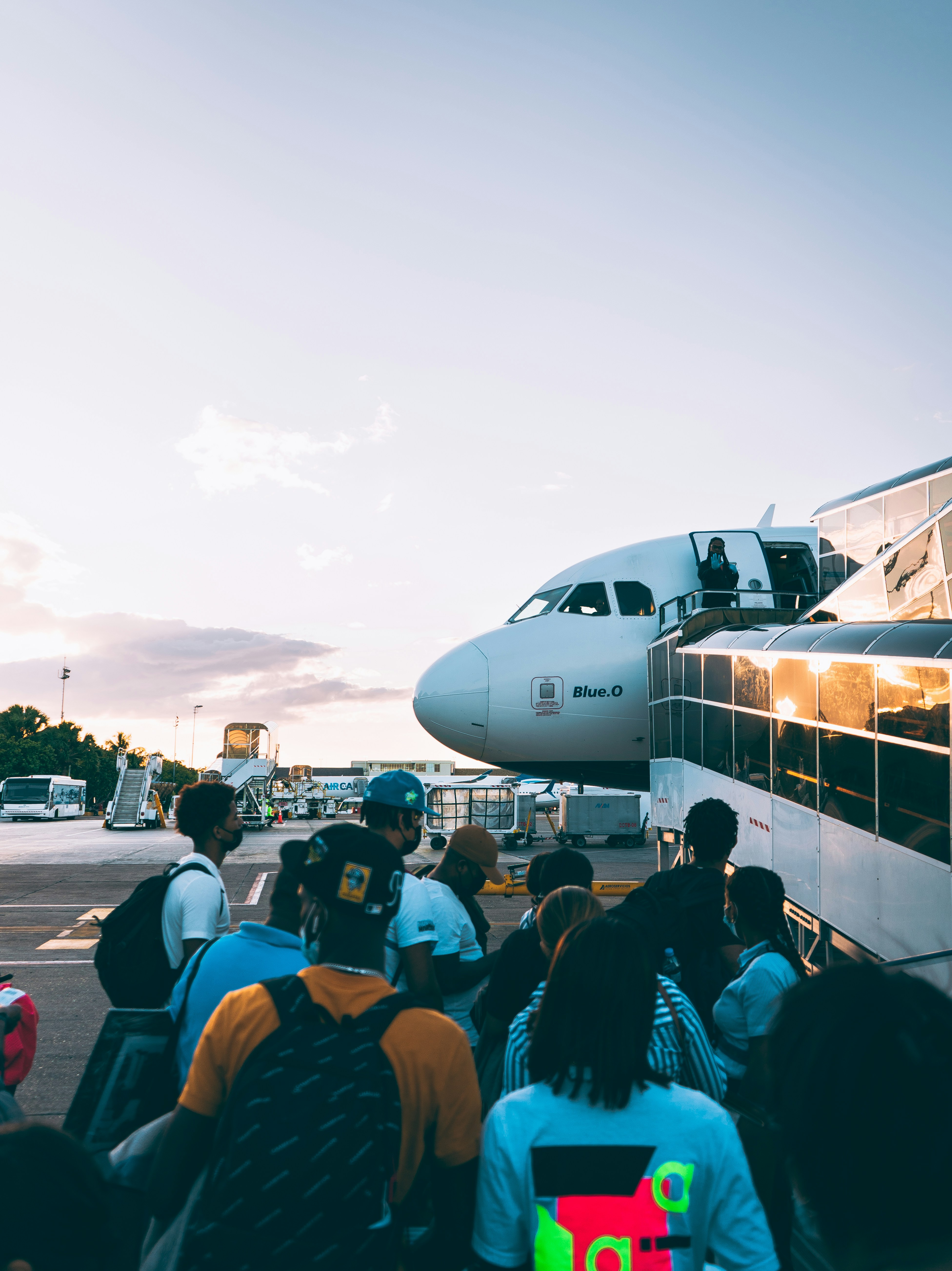 A group of people about to board a plane | Source: Unsplash