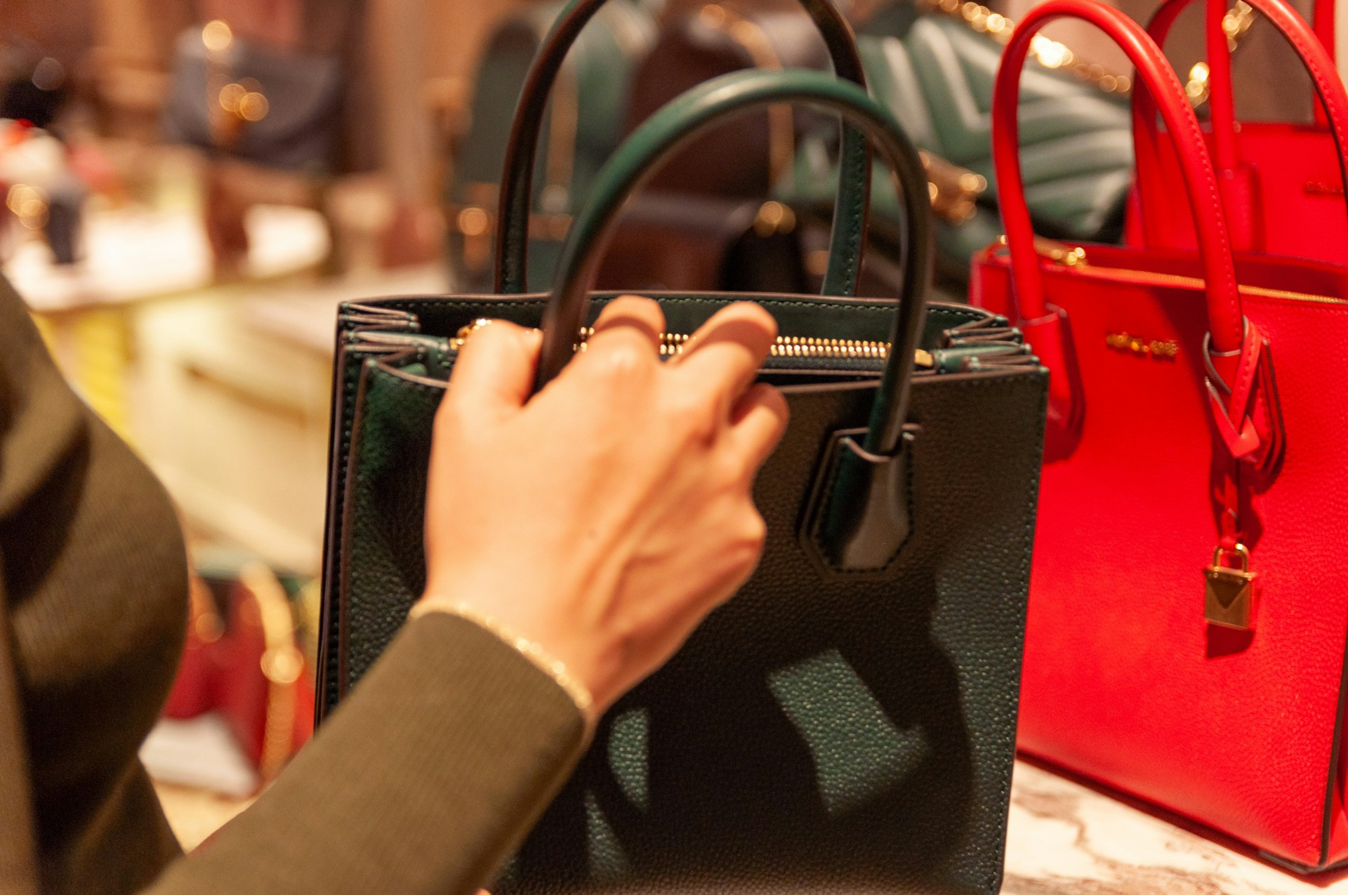 A woman in a bag store | Source: Unsplash