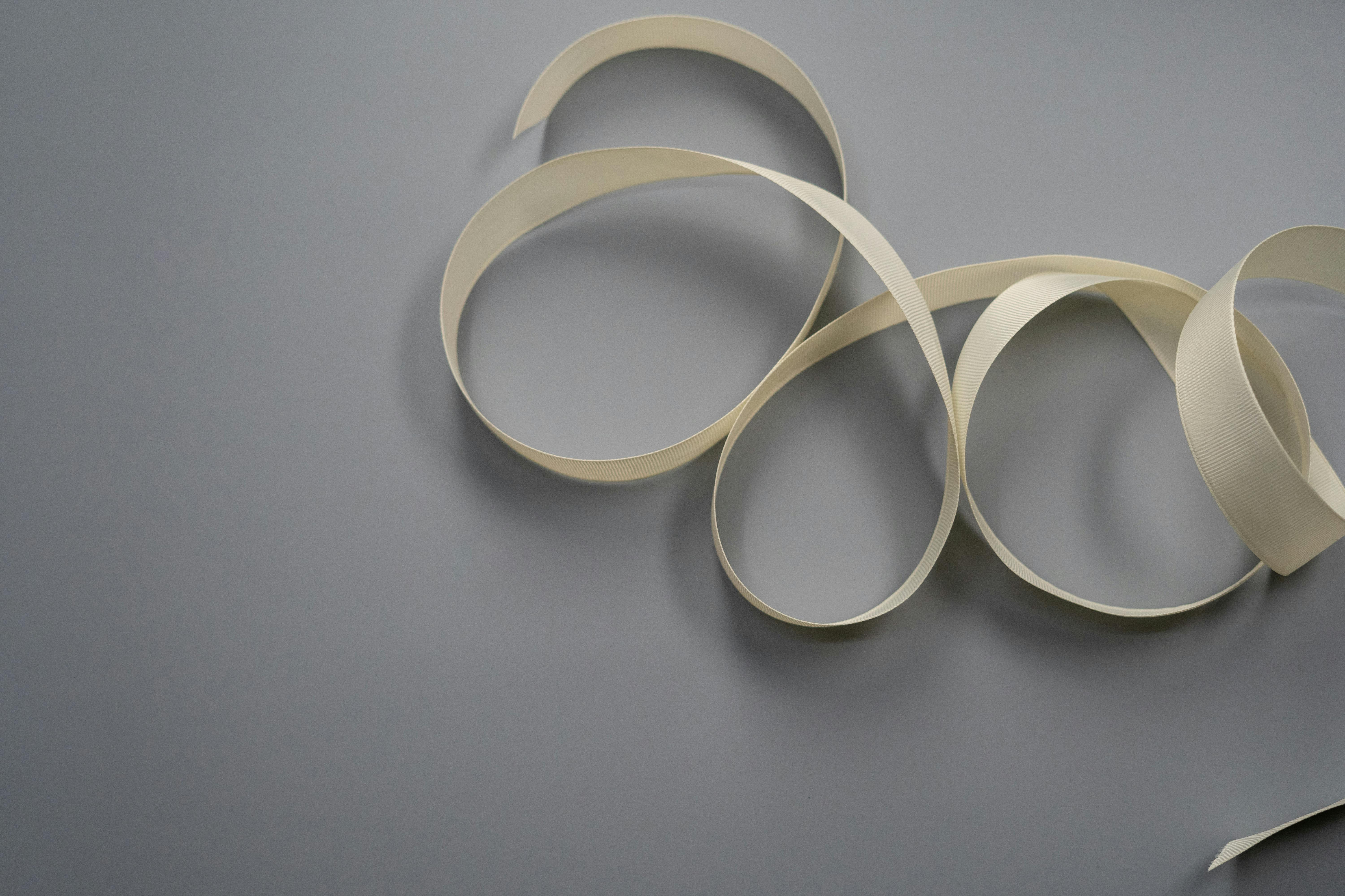 White ribbon on the floor | Source: Pexels