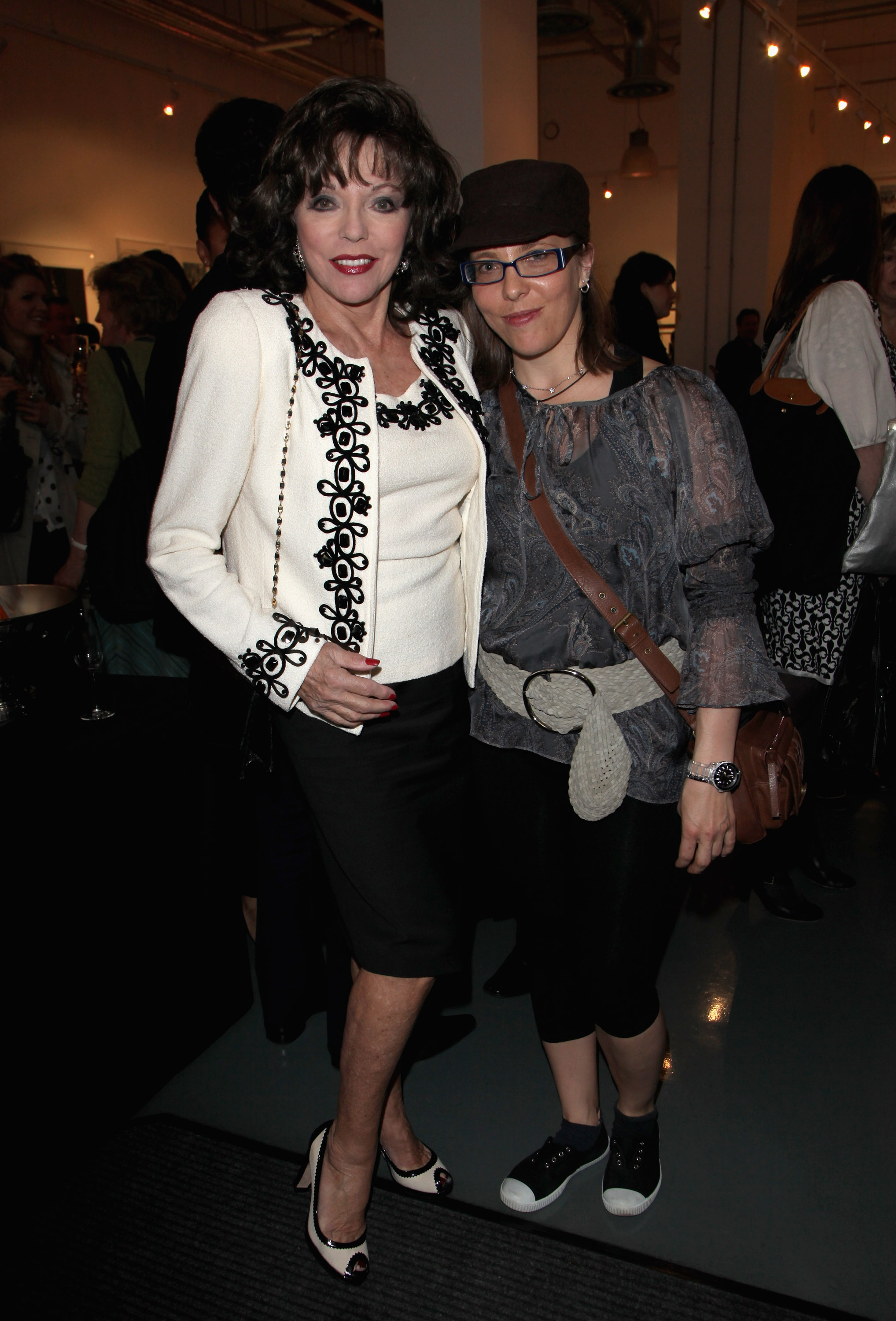 Joan Collins and her daughter, Katyana Kass, at the 'Slim, Rich & Famous' Private View hosted by Getty Image Gallery on Eastcastle Street on April 22, 2009, in London, England. | Source: Getty Images