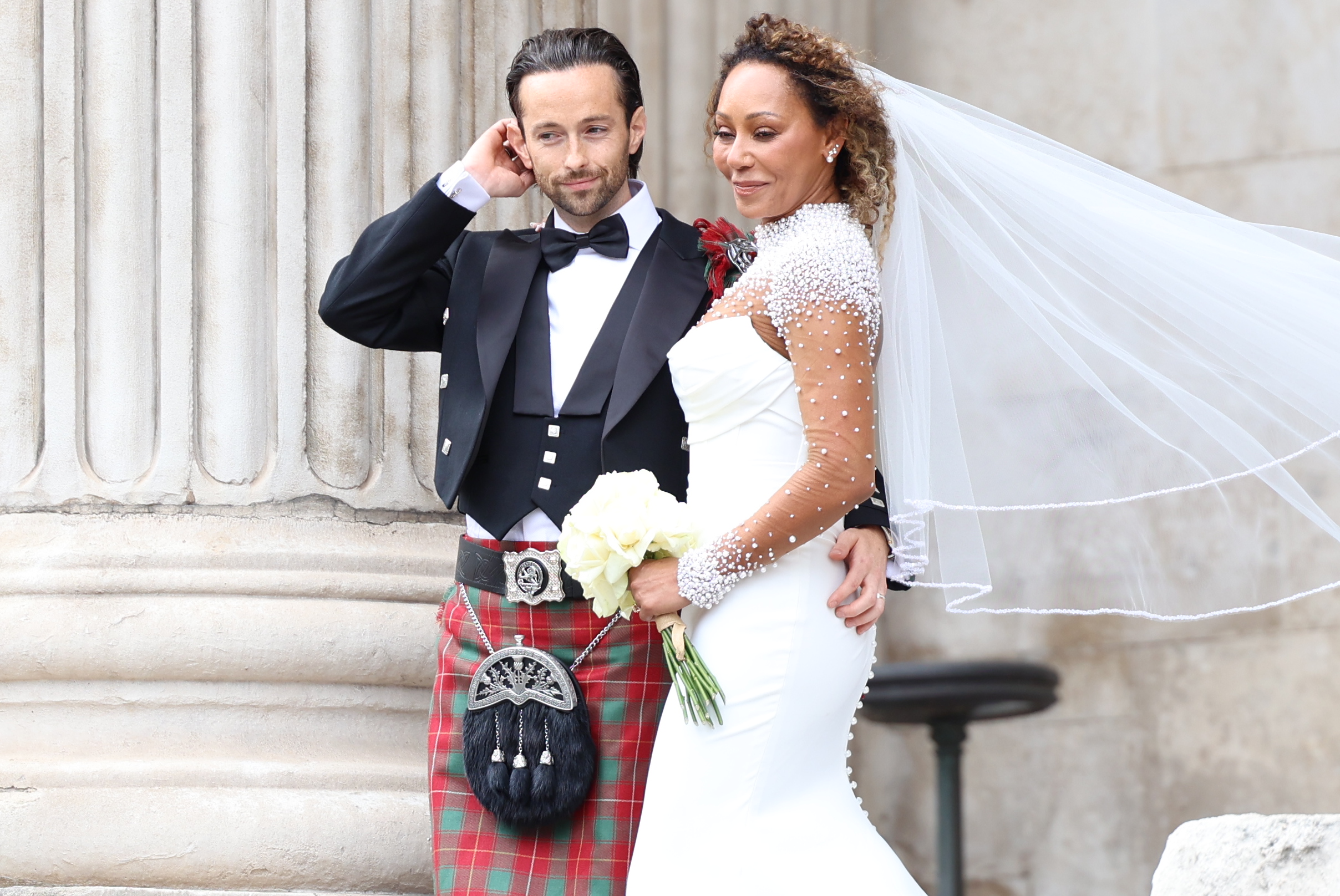 Rory McPhee and Mel B depart following their wedding in the OBE (Order of the British Empire) Chapel at St Paul's Cathedral on July 5, 2025, in London, England. | Source: Getty Images