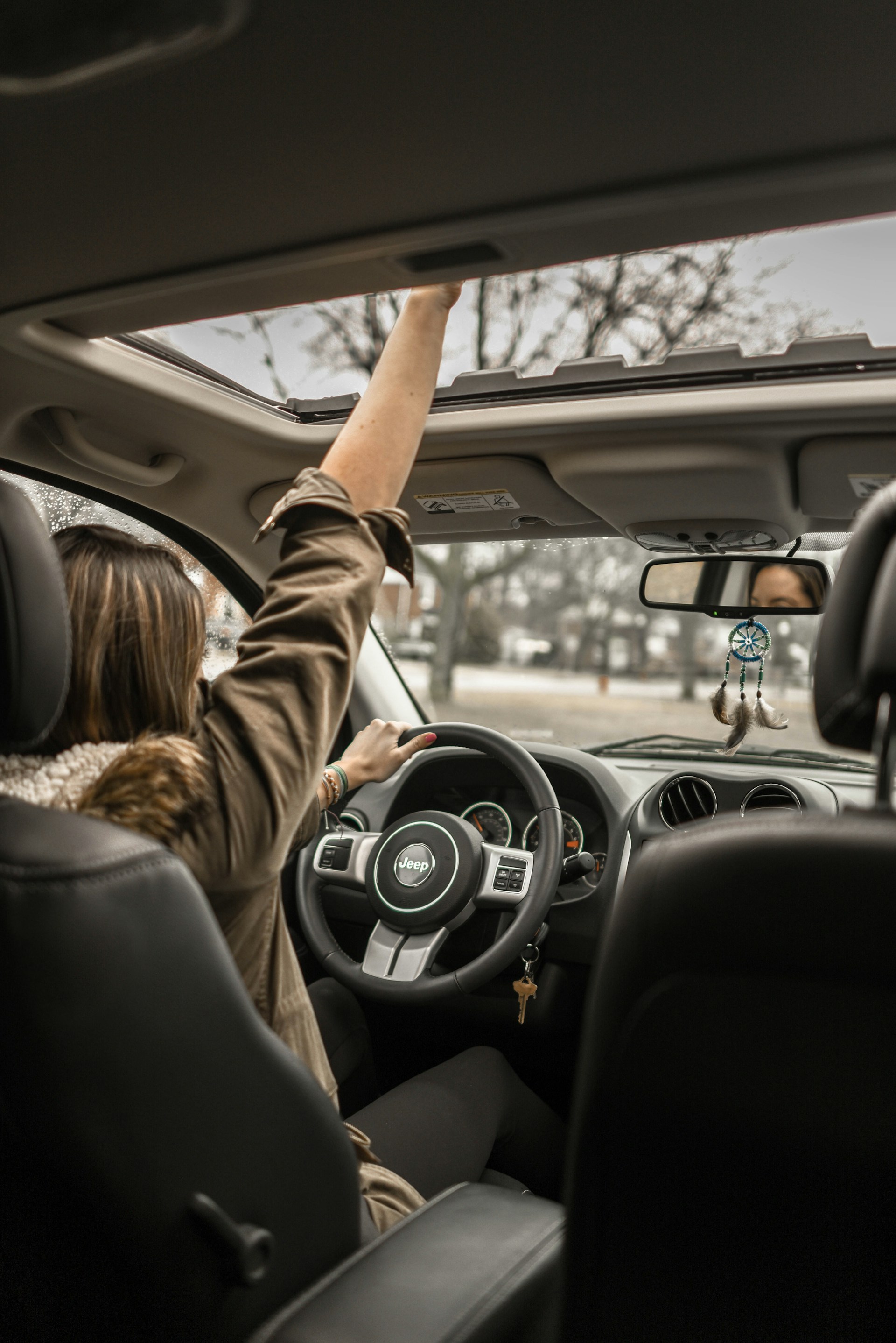 A woman driving her car | Source: Unsplash