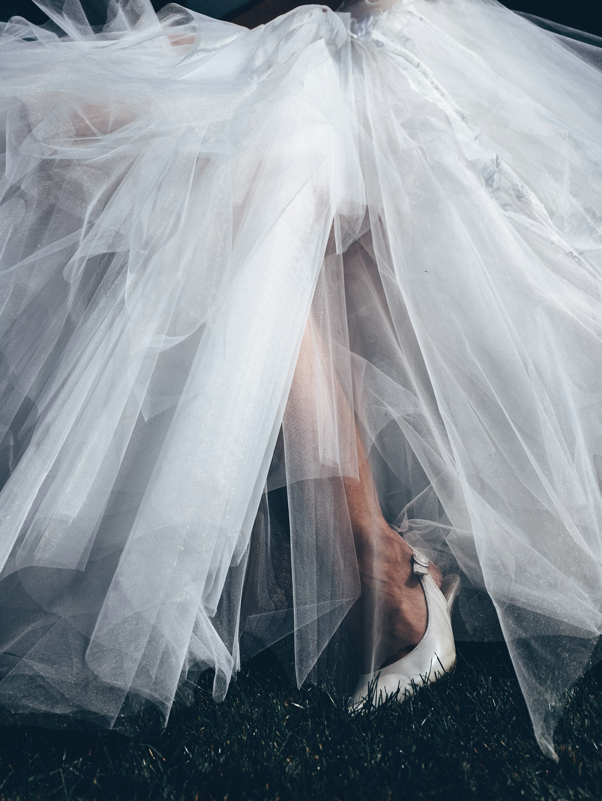 A woman wearing a wedding gown taking a step | Source: Unsplash