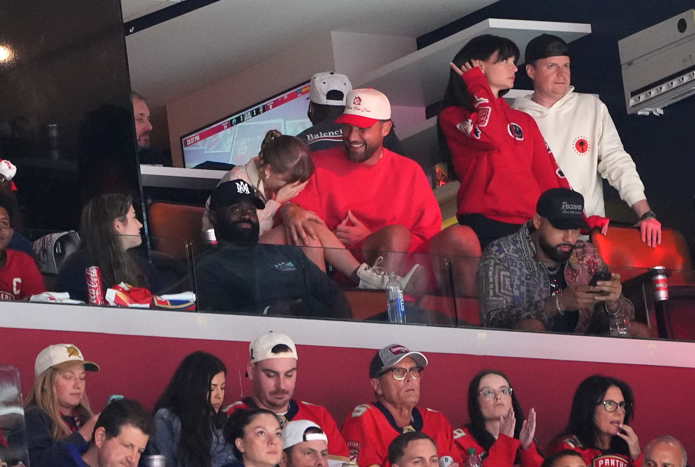 Travis Kelsey and recording artist Taylor Swift watch game 4 of the Stanley Cup Final between the Florida Panthers and the Edmonton Oilers in Game Four of the 2025 Stanley Cup Final at the Amerant Bank Arena on June 12, 2025, in Sunrise, Florida. | Source: Getty Images