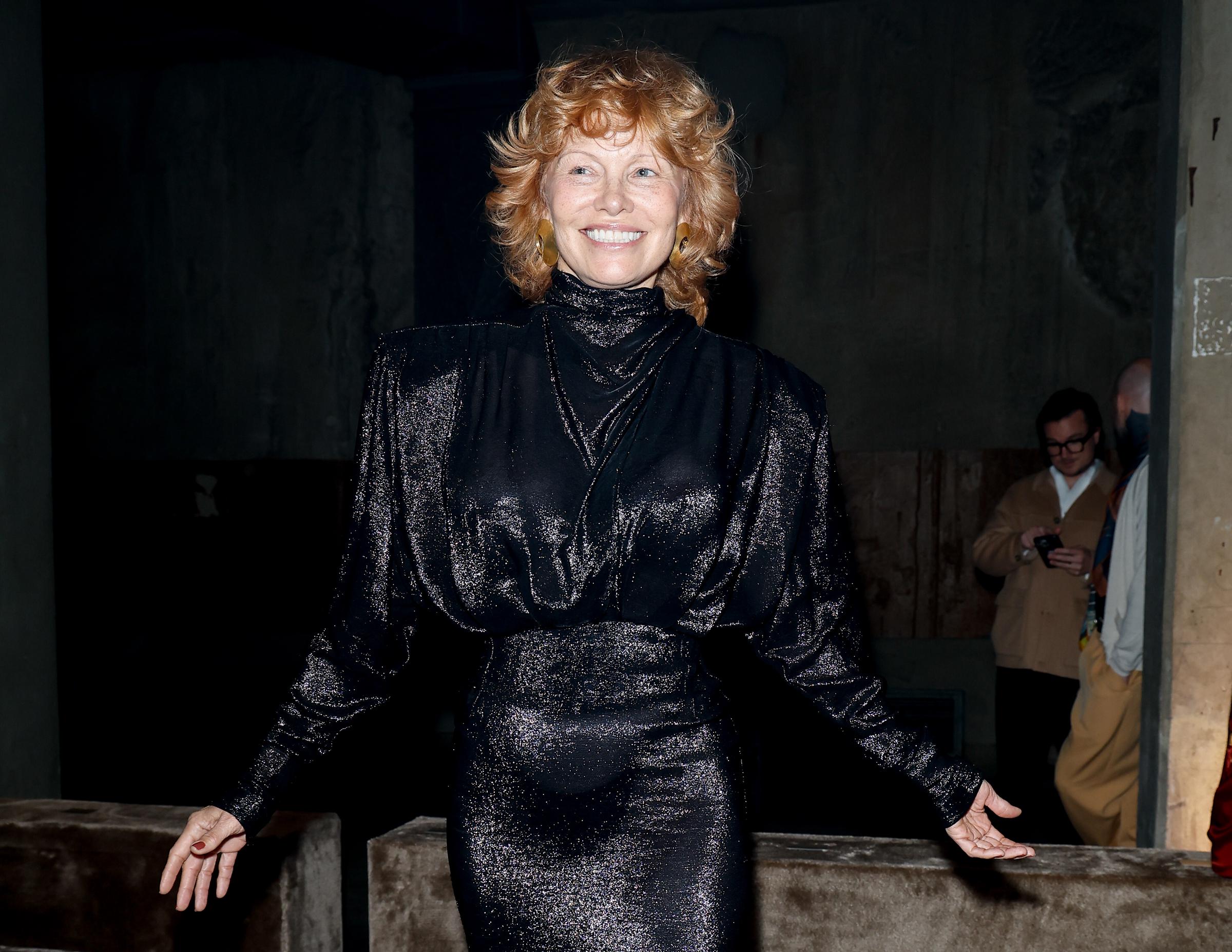 Pamela Anderson channeling red hair t the Mugler fashion show on October 2, 2025 in Paris, France | Source: Getty Images
