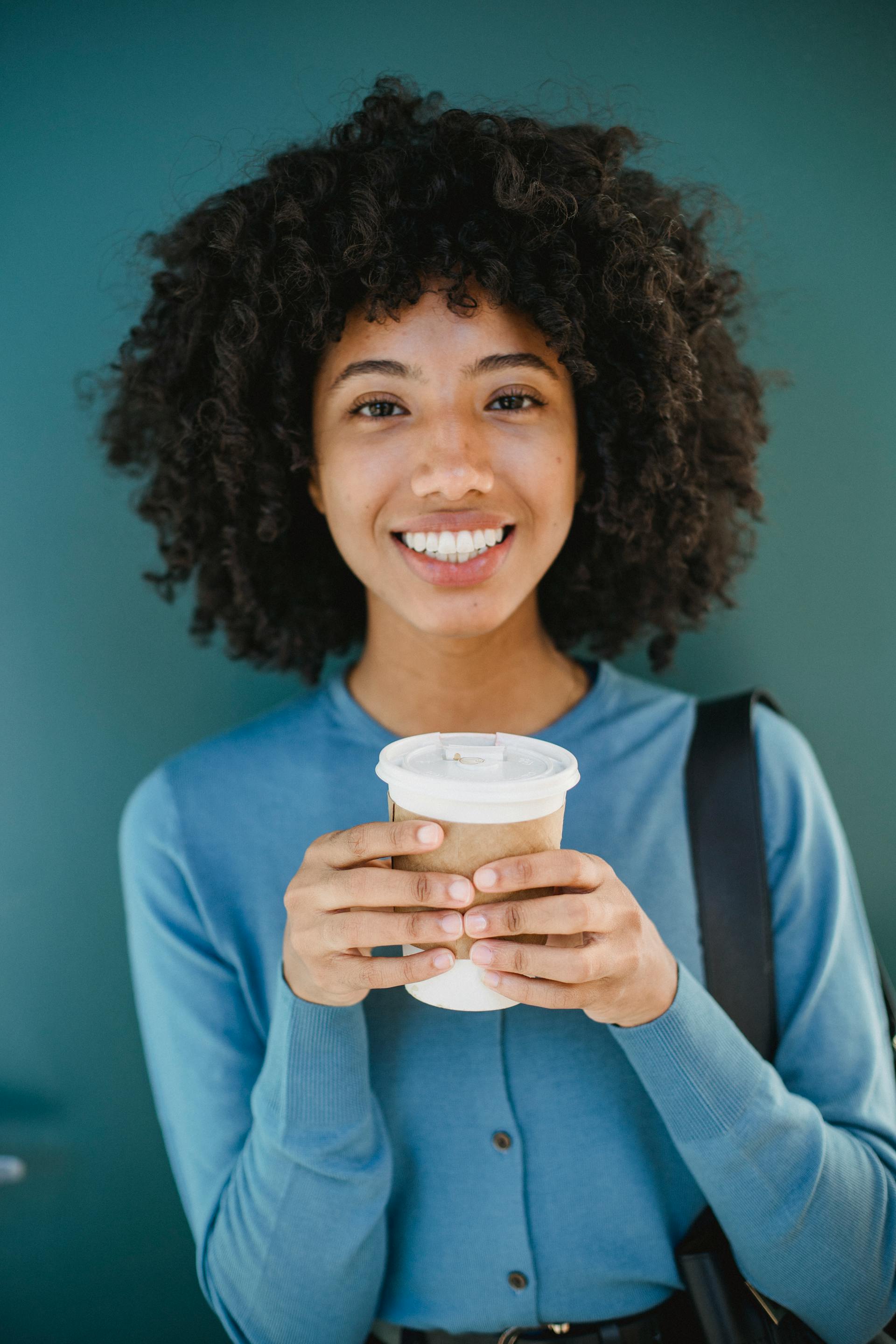 A woman smiling | Source: Pexels